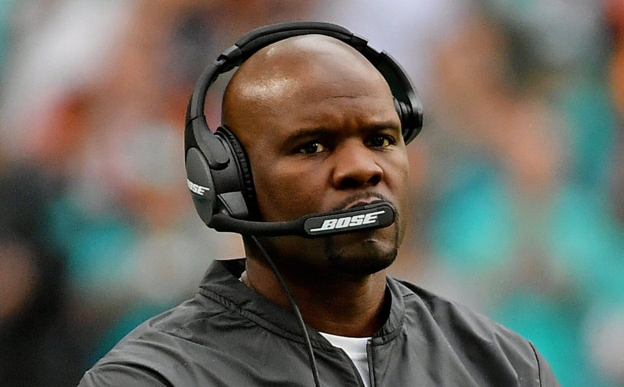 Brian Flores watches the game from the sideline as Dolphins head coach at Hard Rock Stadium
