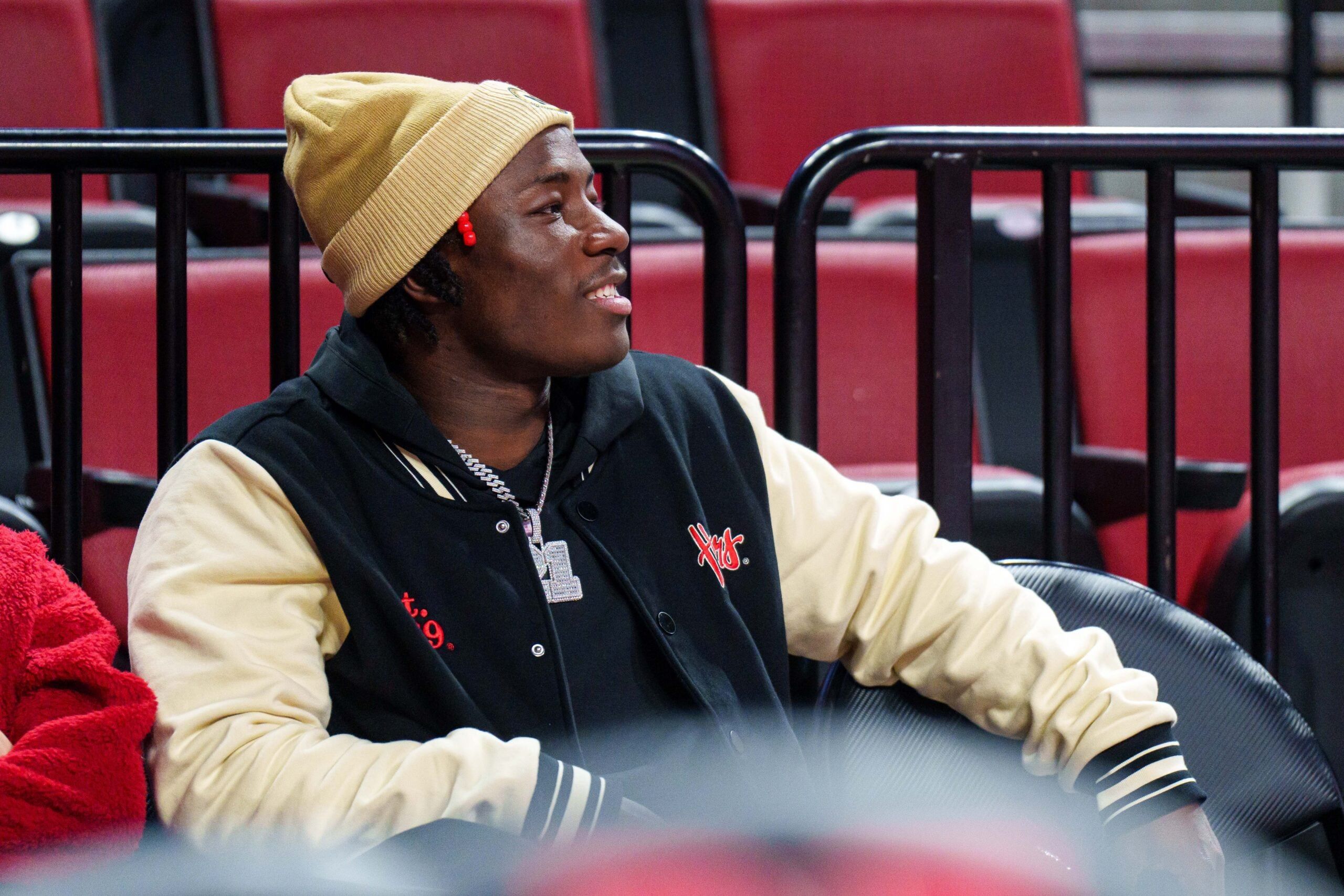 Emmett Johnson watches from the sideline during a Nebraska game at Pinnacle Bank Arena