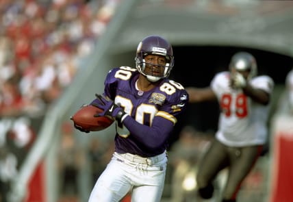 Cris Carter runs a route during a Vikings game against the Buccaneers