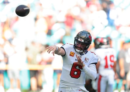 Baker Mayfield warms up on the field before a Buccaneers game at Hard Rock Stadium