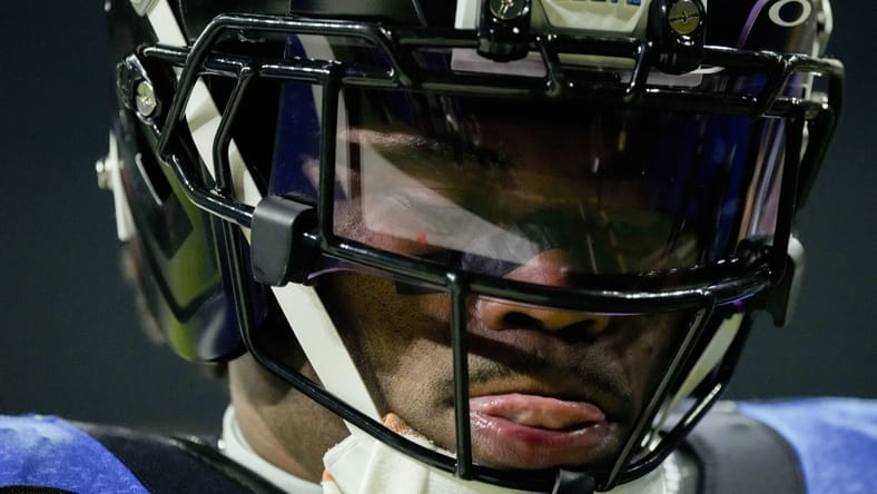 Kenny Moore II walks on the field during a Colts game against the 49ers at Lucas Oil Stadium.
