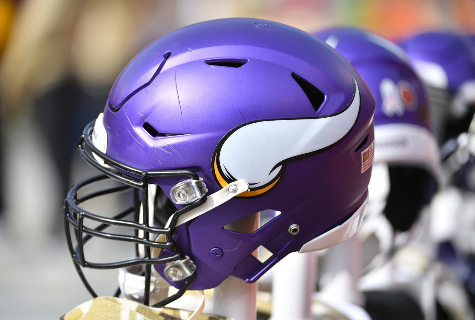 Minnesota Vikings helmet on sideline during game at Arrowhead Stadium.