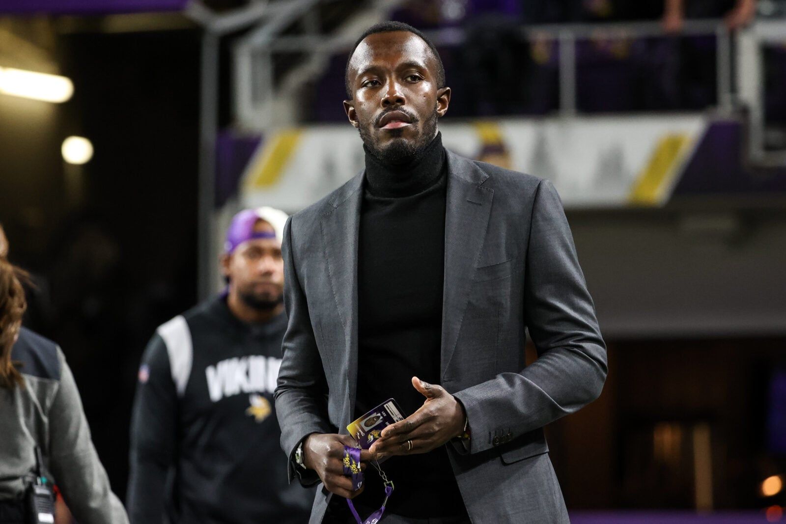 Kwesi Adofo-Mensah watches pregame activity before the Vikings face the Patriots.