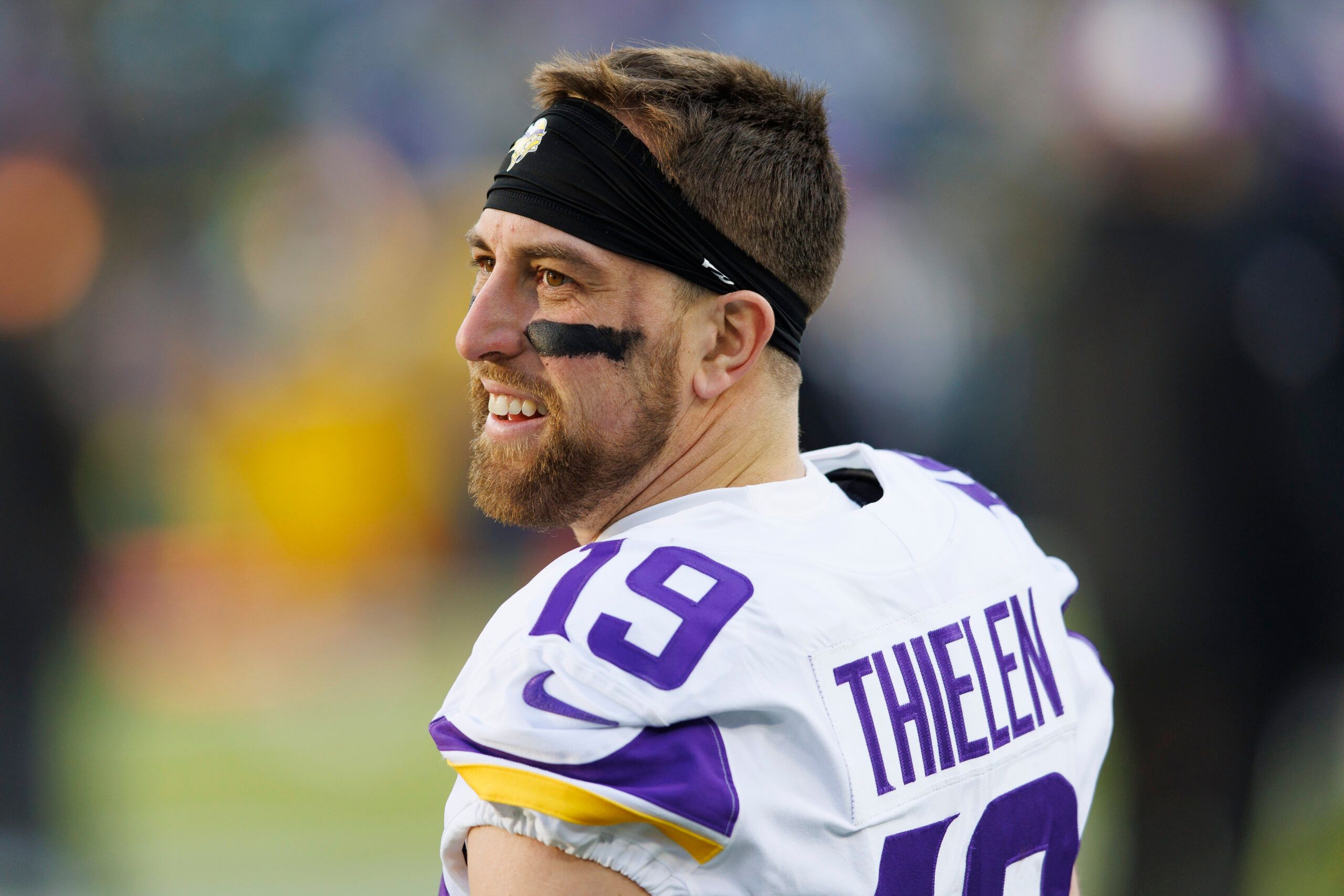 Adam Thielen warms up at Lambeau Field before a Vikings–Packers matchup.