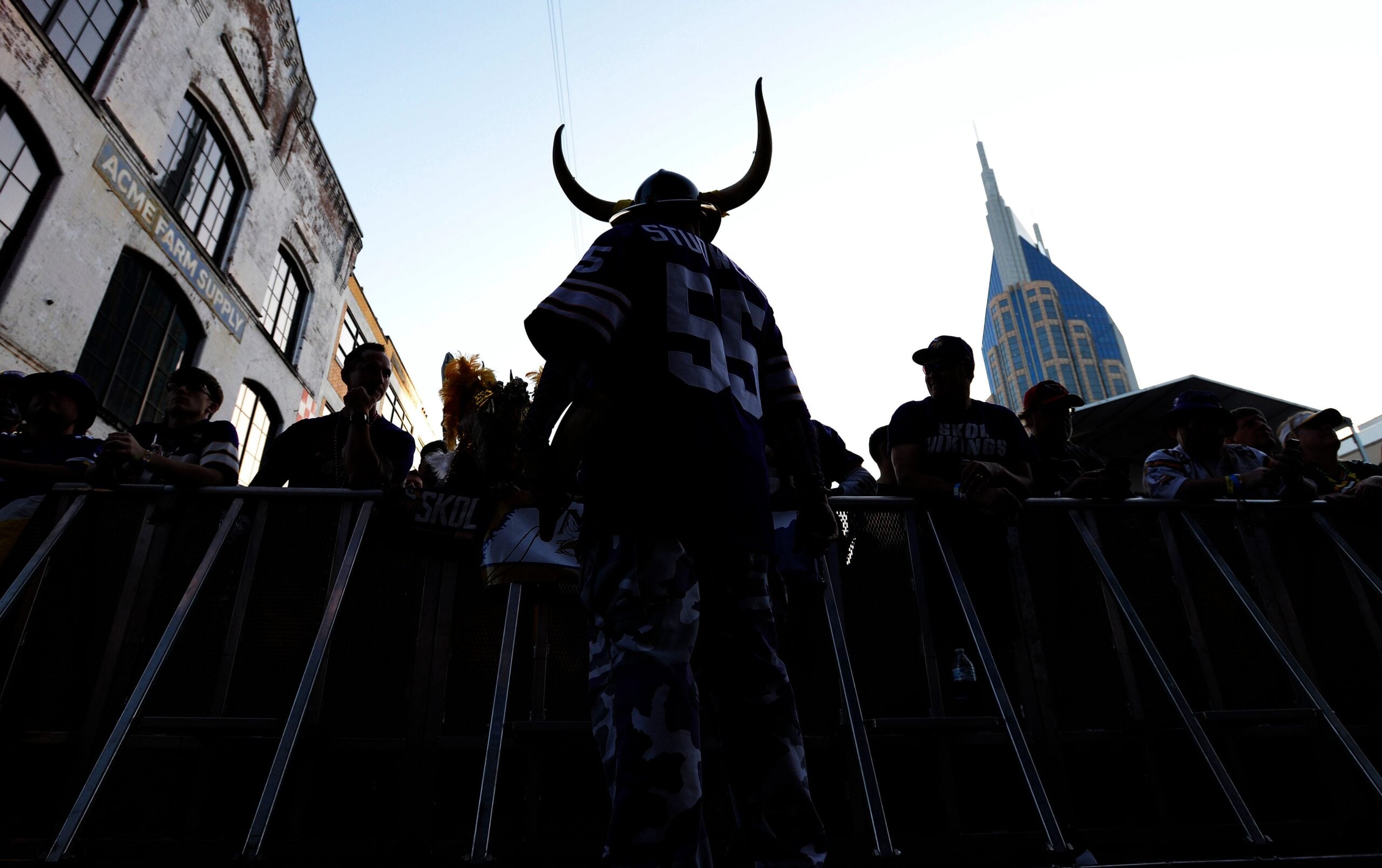 Vikings fan greets others near the NFL Draft stage in Nashville