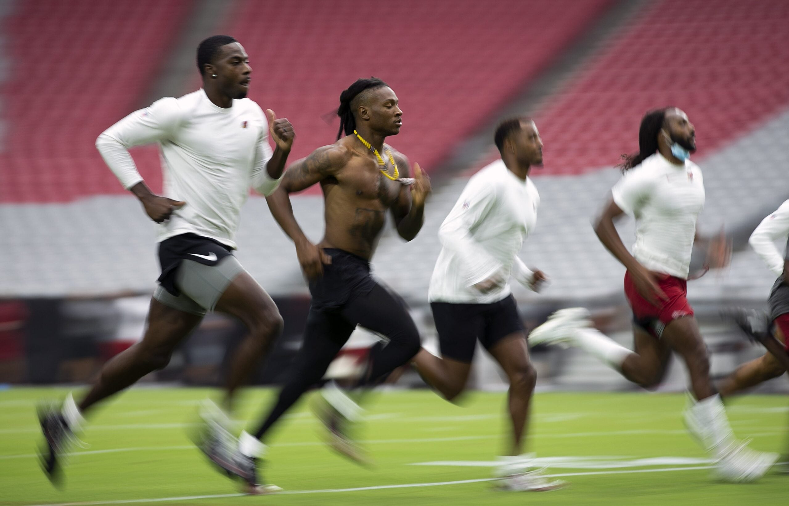 DeAndre Hopkins runs during conditioning drills at Cardinals training camp in Glendale, Arizona.