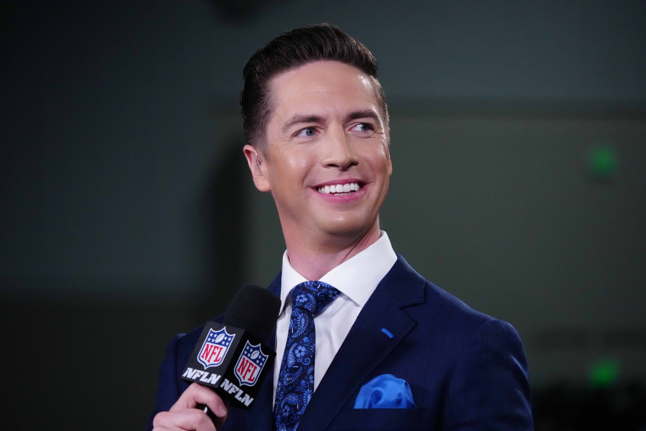 Tom Pelissero works during NFL Combine coverage at the Indiana Convention Center in Indianapolis.