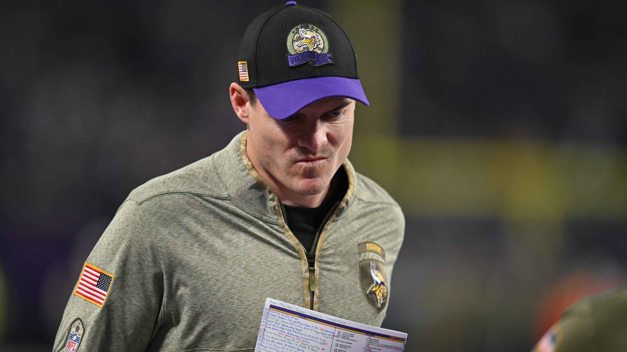 Kevin O’Connell walks off the field at U.S. Bank Stadium during a Vikings game.