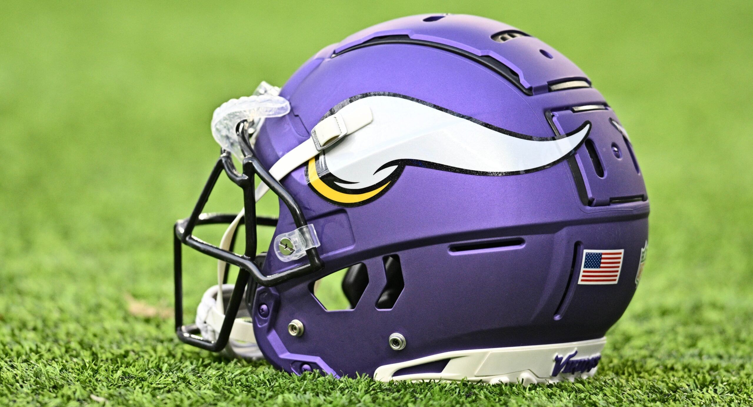 Minnesota Vikings helmet on the field before a 2023 preseason game at U.S. Bank Stadium.