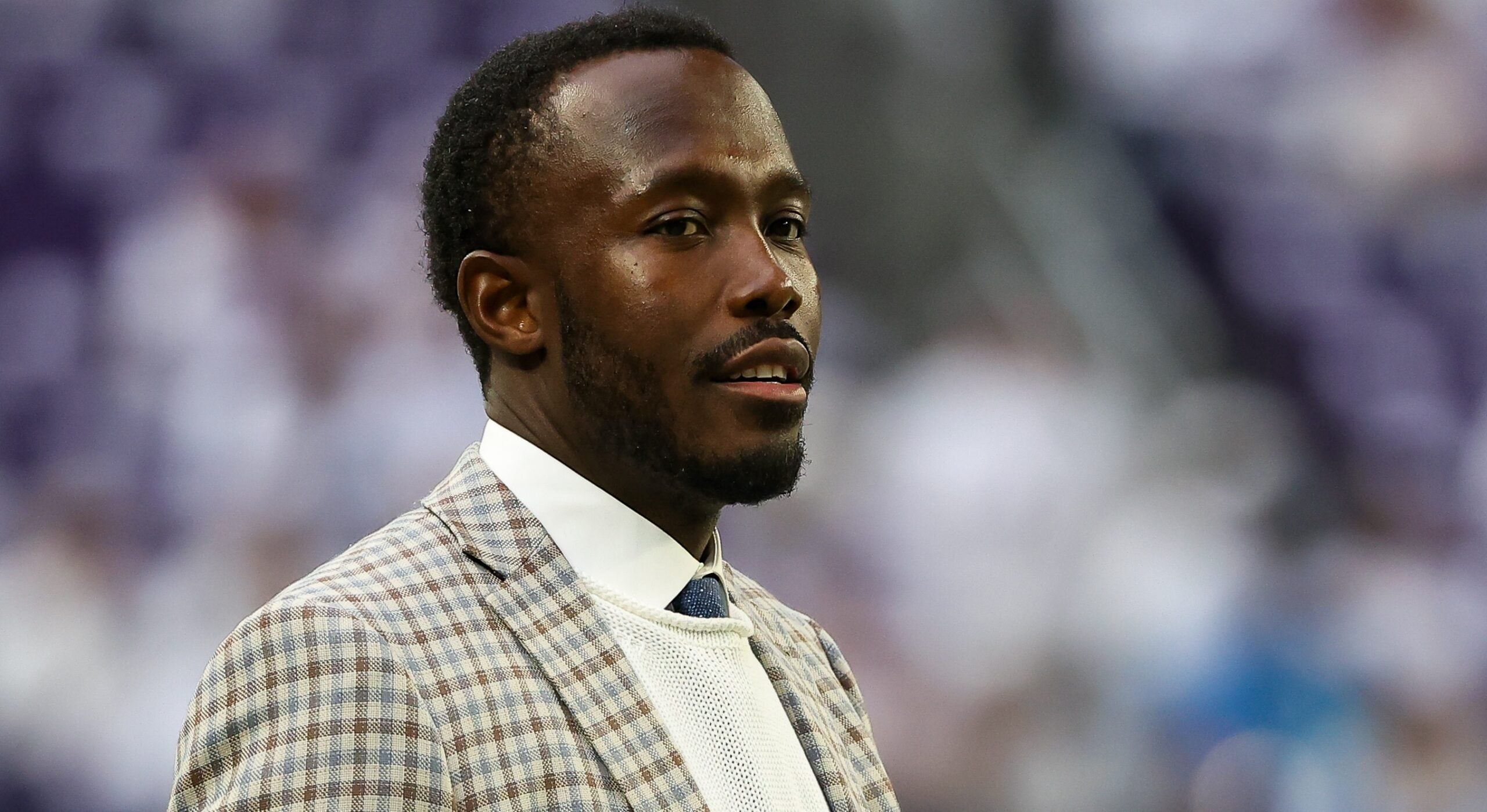 Kwesi Adofo-Mensah on the field before Vikings game at U.S. Bank Stadium.