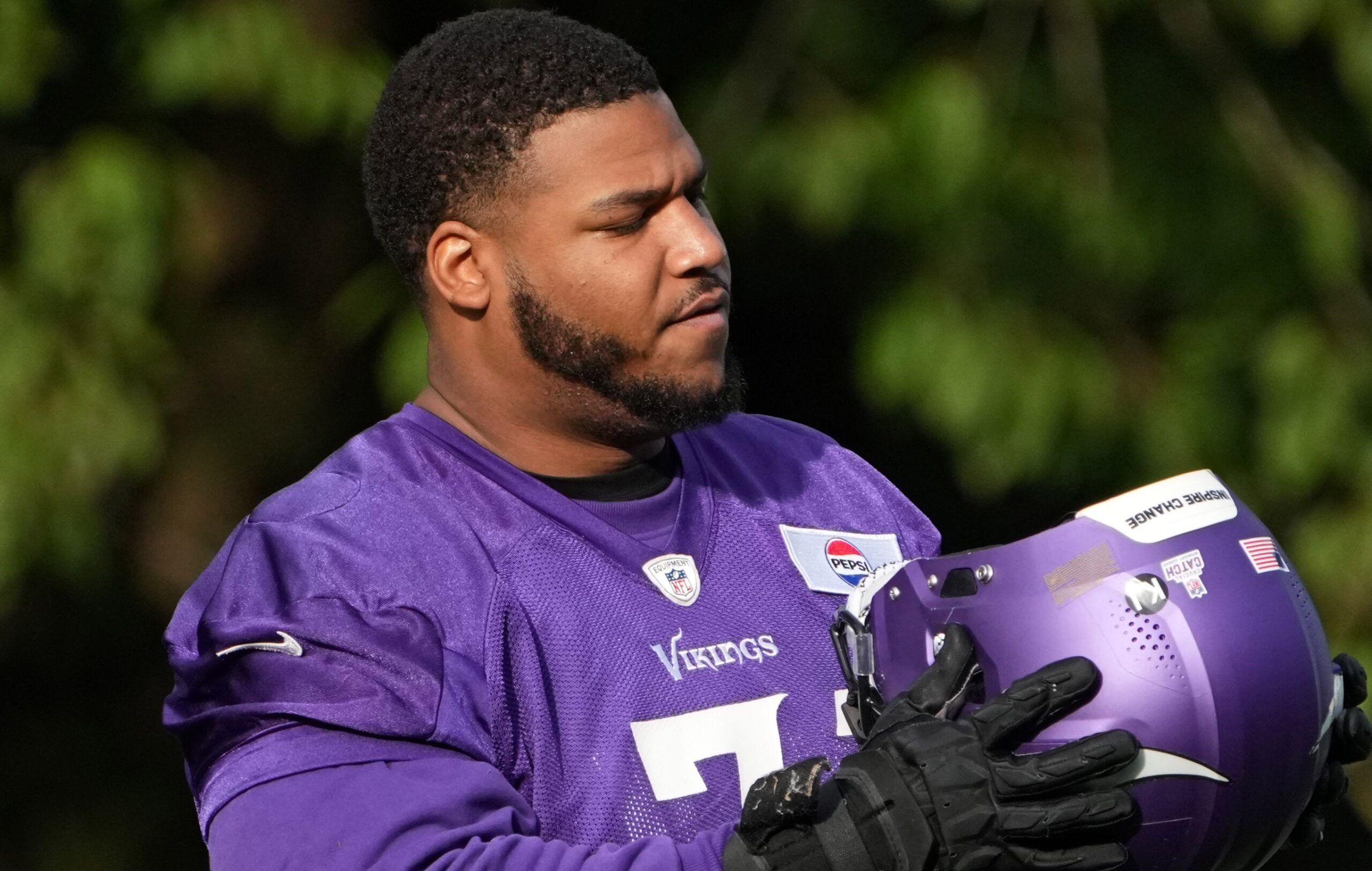 Christian Darrisaw practices with the Vikings in the United Kingdom in 2024.