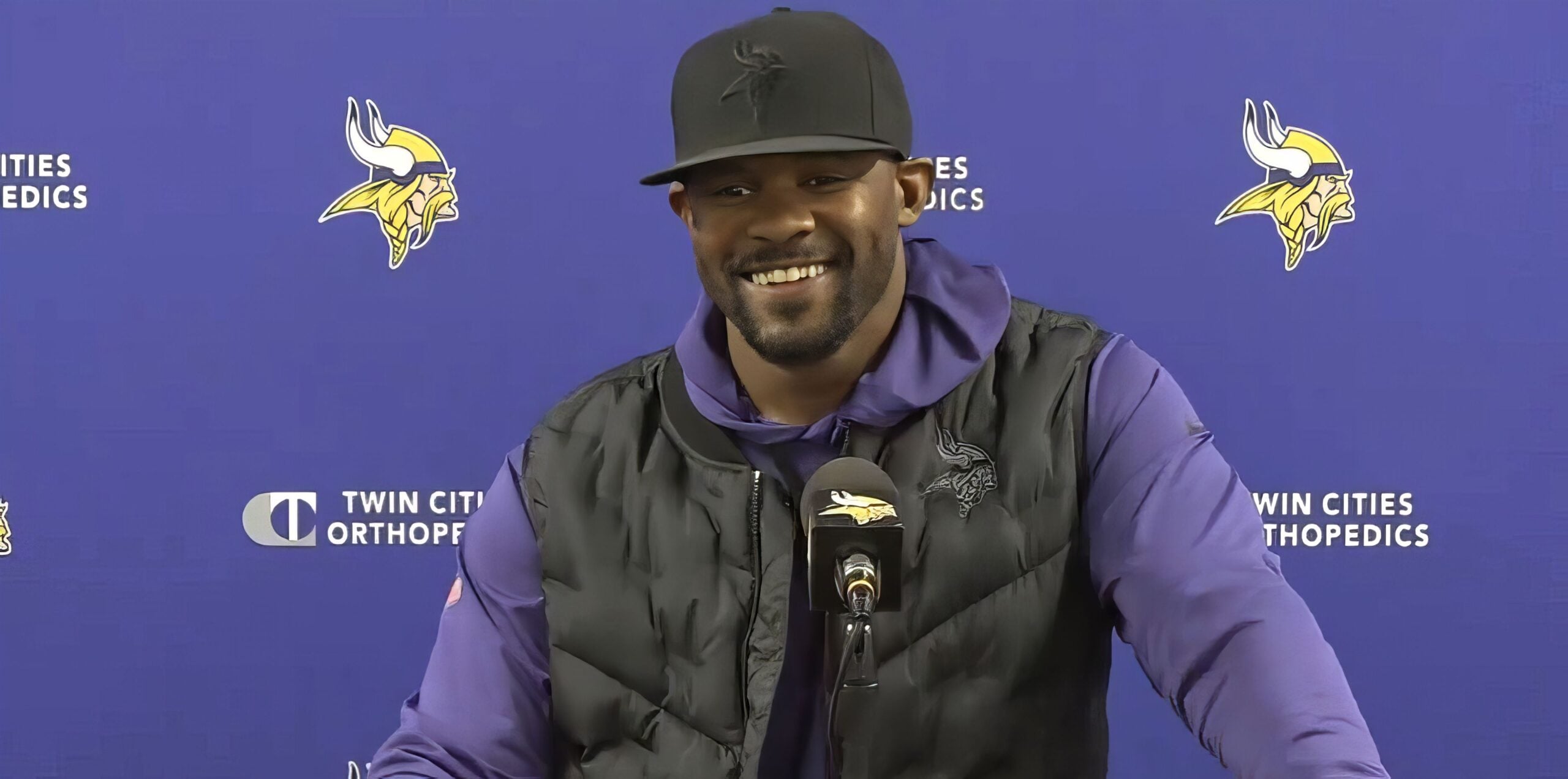 Brian Flores speaks to the media at the TCO Performance Center.