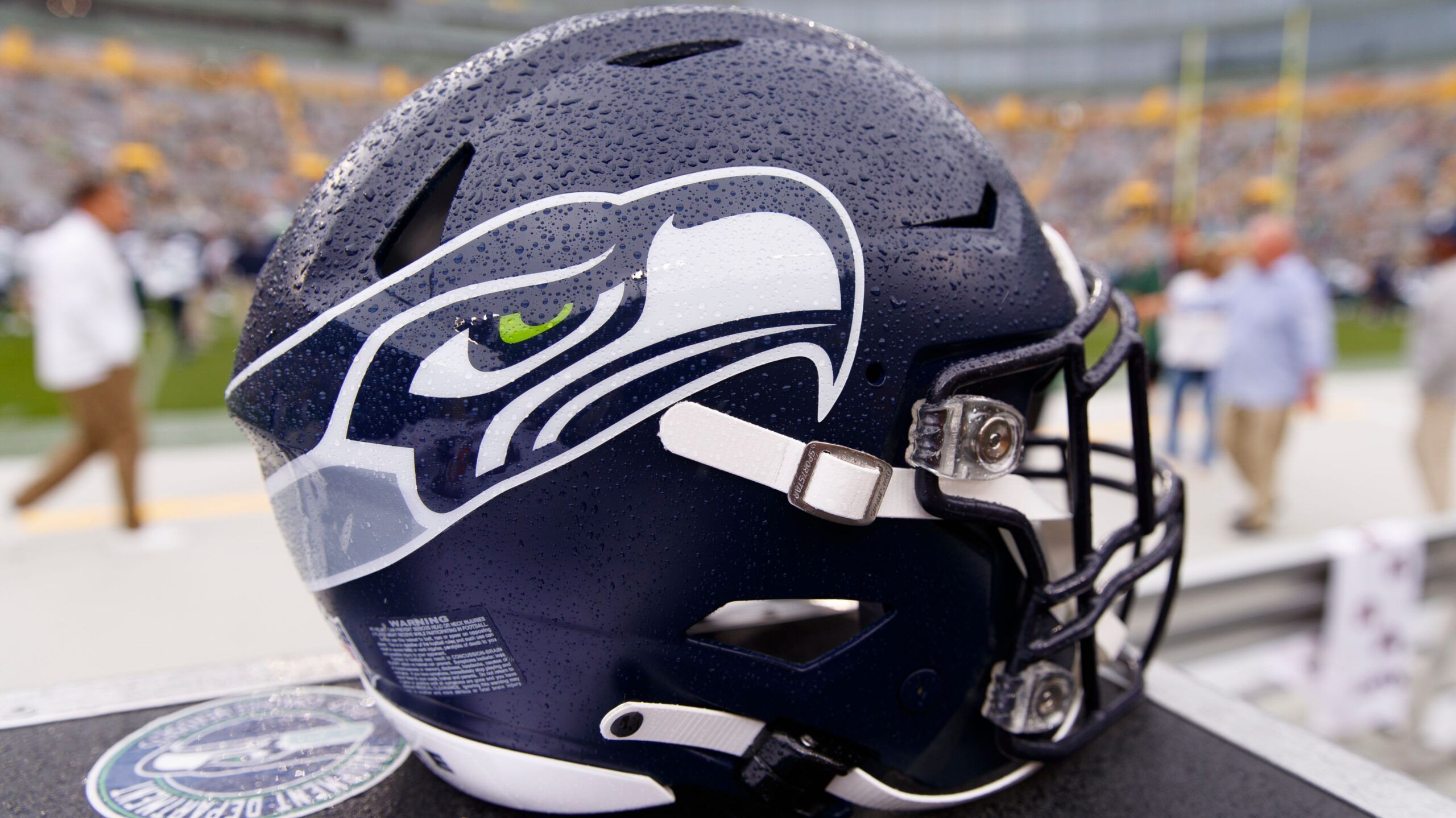 A Seahawks helmet sits on the sideline during warmups at Lambeau Field.