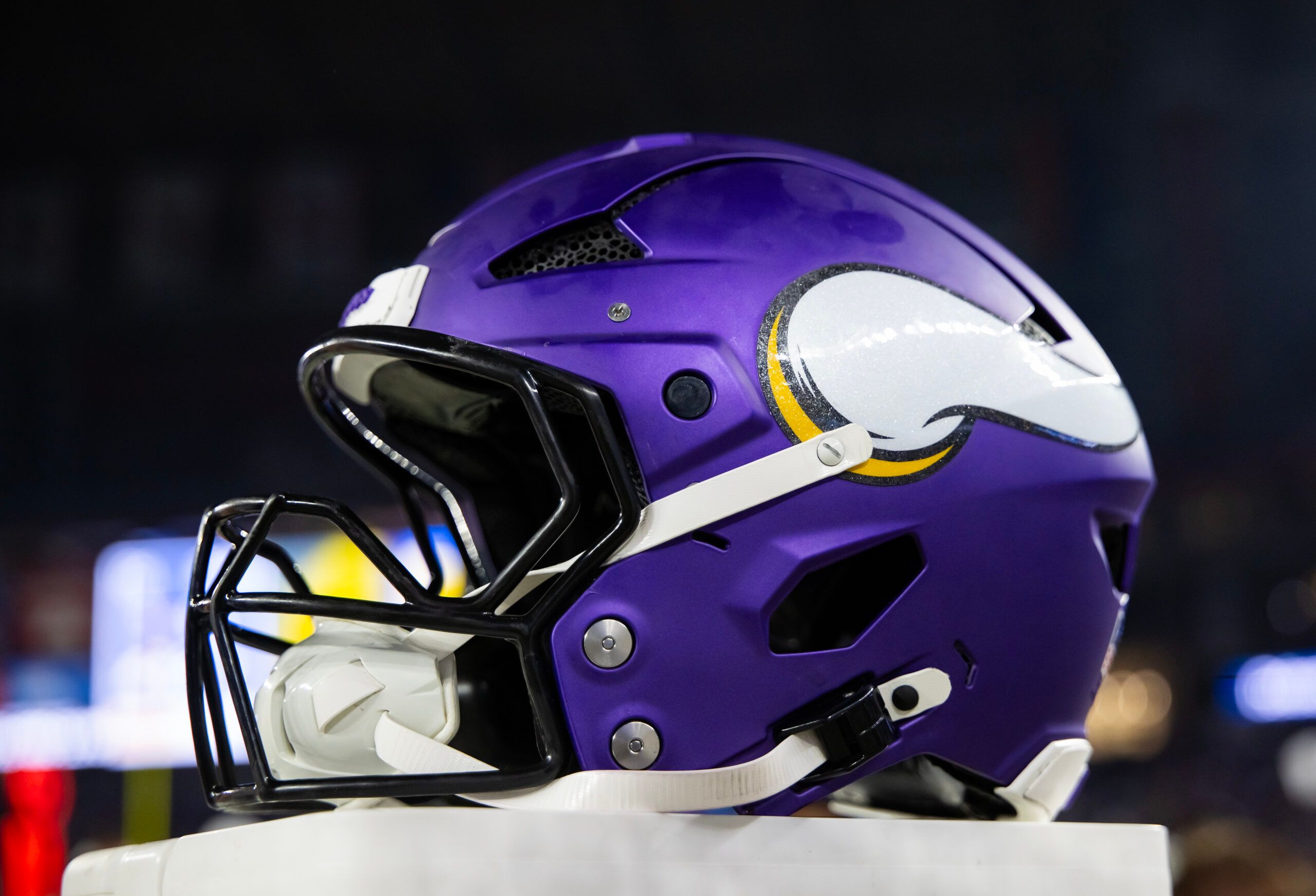 Close-up of a Minnesota Vikings helmet on the sideline during the NFC Wild Card game at State Farm Stadium.