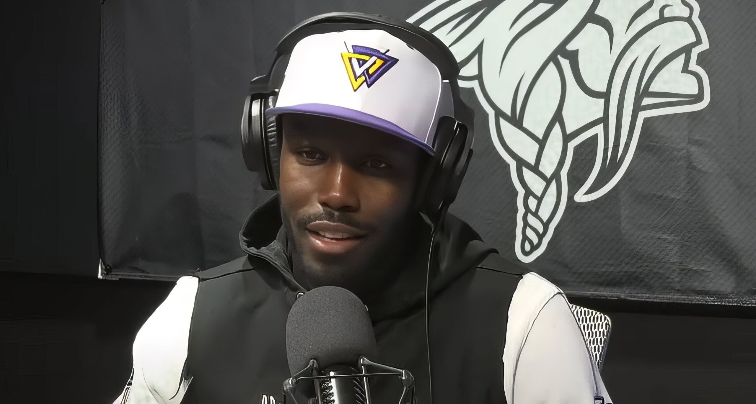 Vikings general manager Kwesi Adofo-Mensah speaks during a radio interview with Paul Allen.