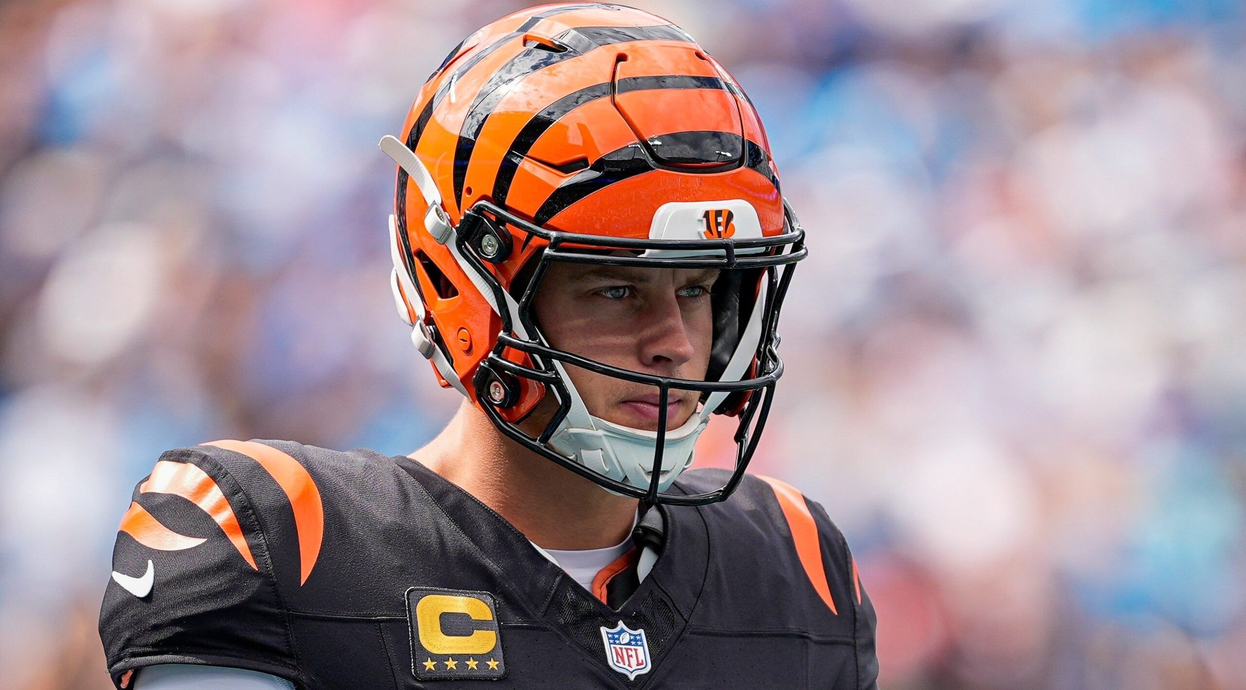 Joe Burrow drops back to pass against the Panthers at Bank of America Stadium.