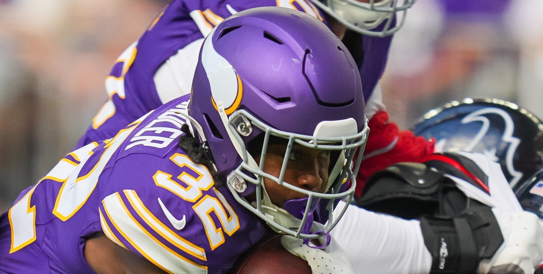 Vikings running back Ty Chandler runs with the ball against the Houston Texans at U.S. Bank Stadium.