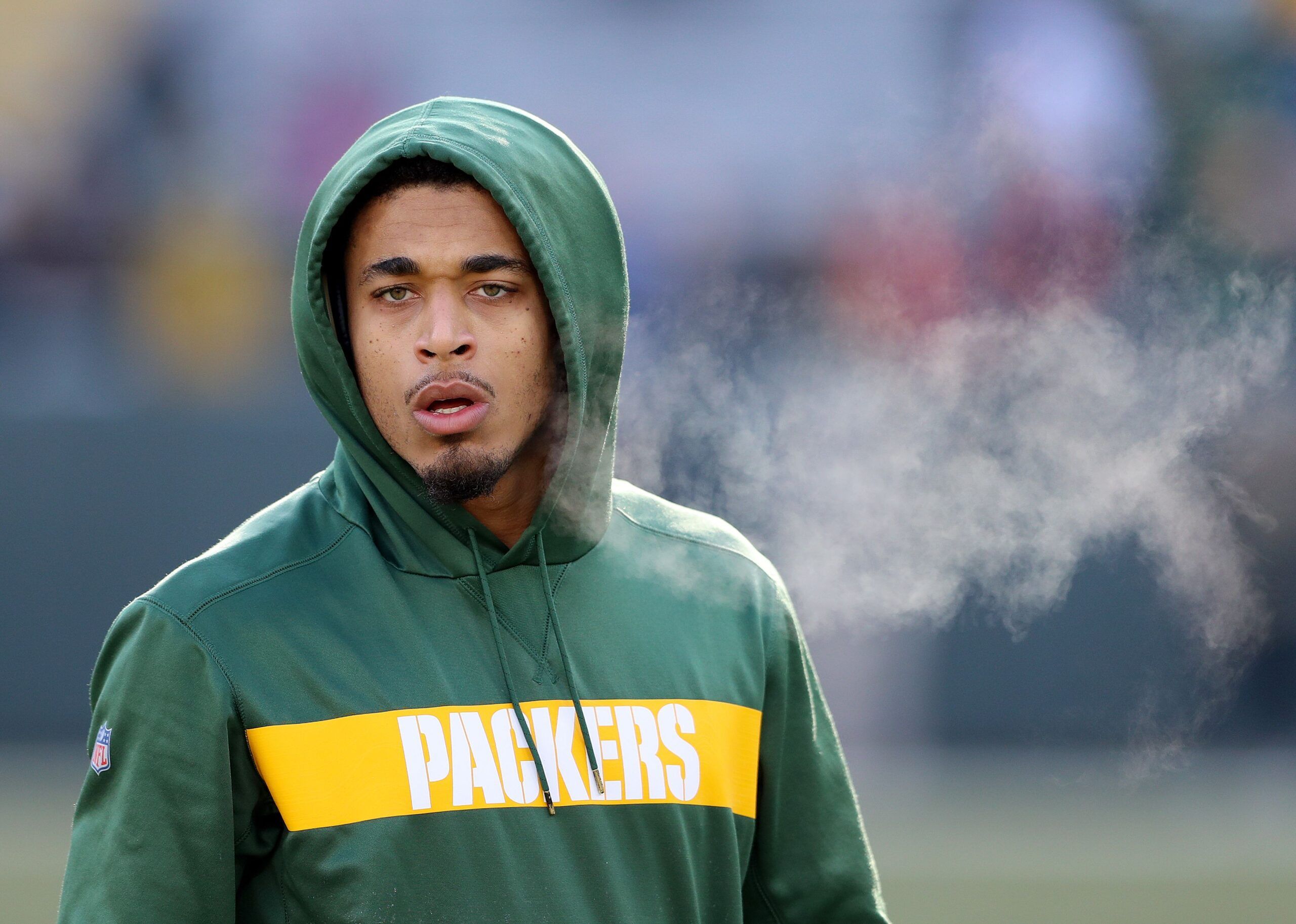 Jaire Alexander exhales in cold air before facing the Falcons at Lambeau Field.