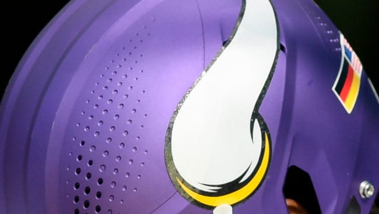 Jay Ward and Aaron Jones of the Minnesota Vikings warm up before game vs. Titans.