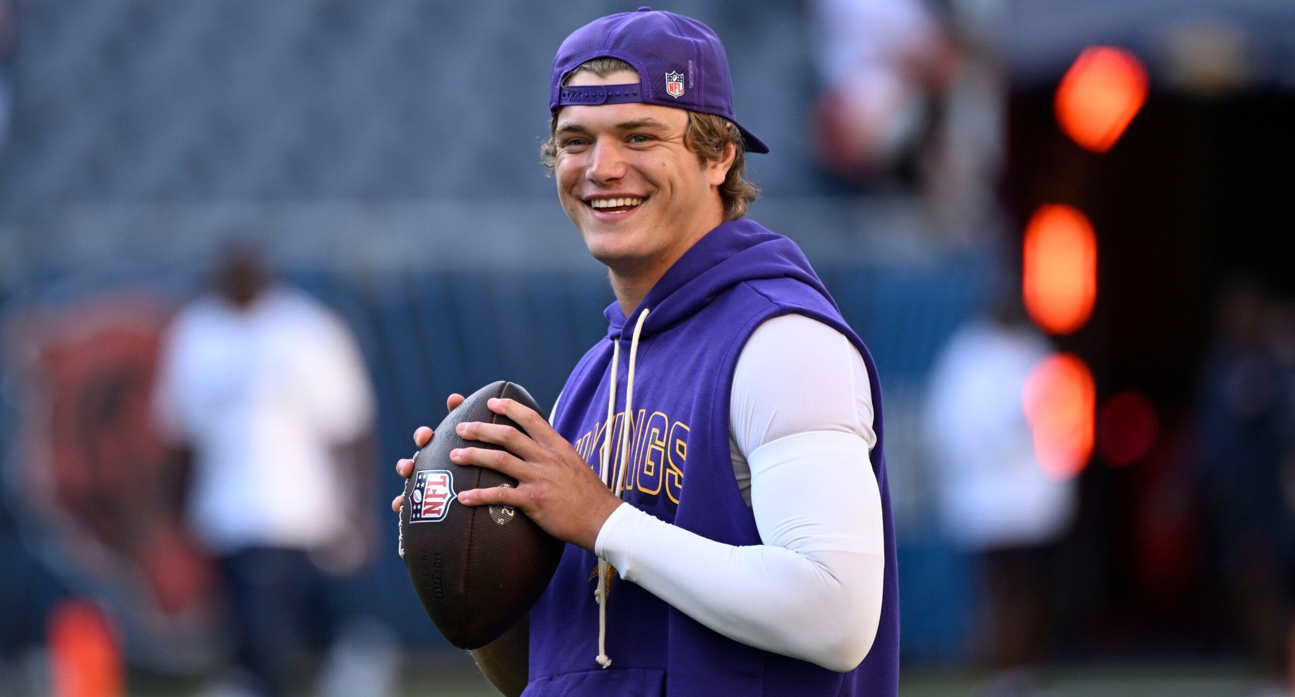 J.J. McCarthy practices on the field before the Vikings’ game against the Bears.