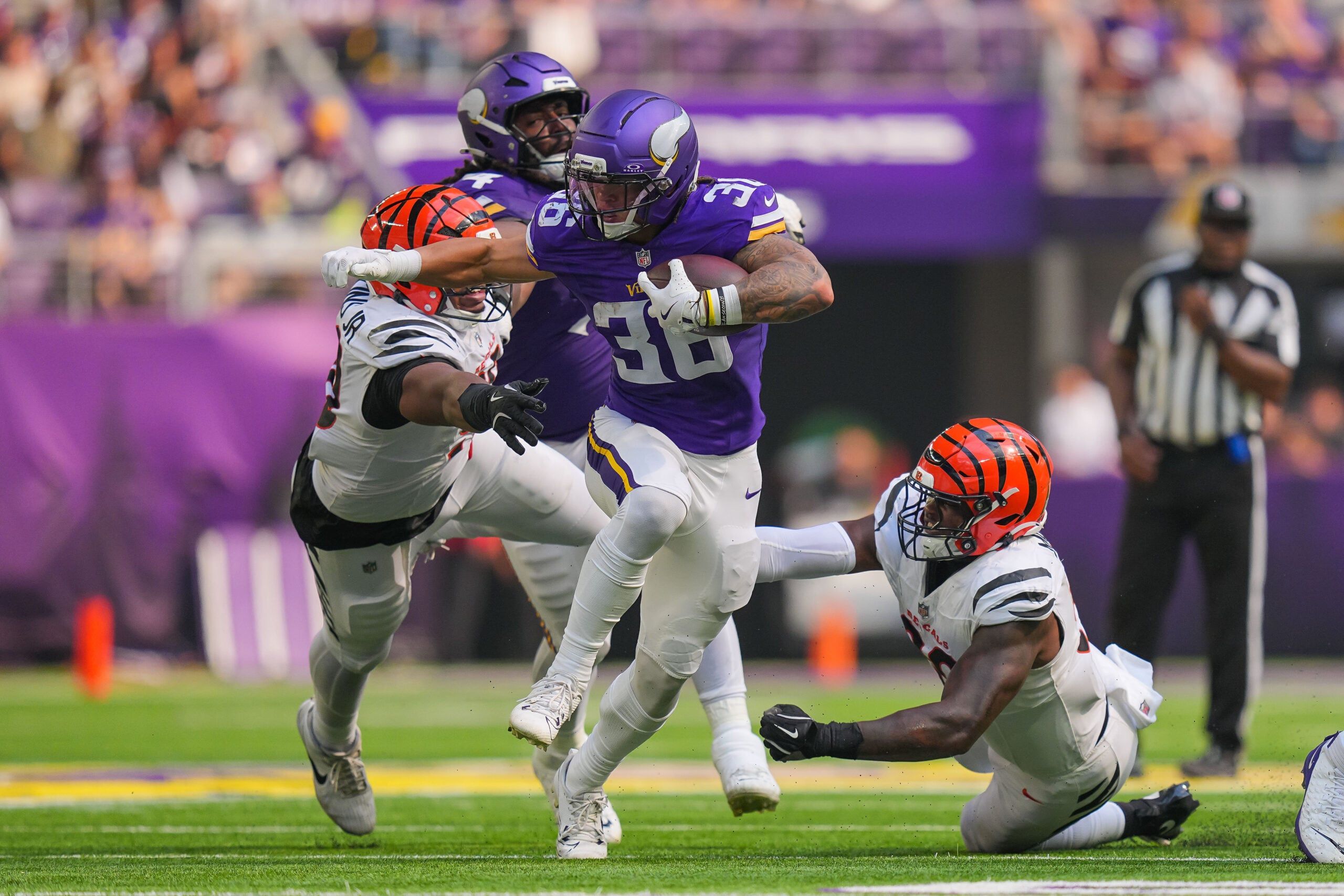 Zavier Scott runs the ball during Vikings vs. Bengals game.