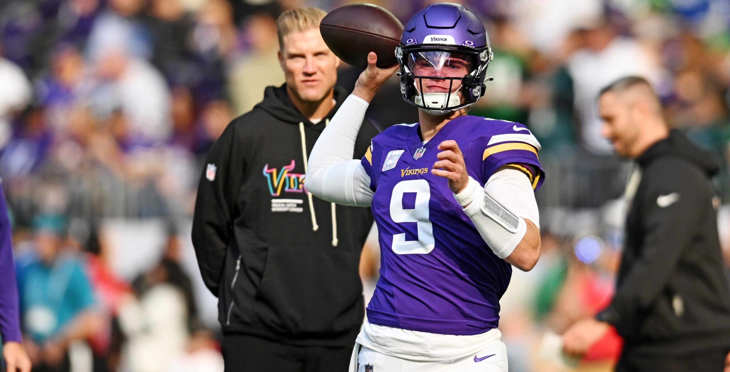 Vikings QB J.J. McCarthy in 2025, warming up before MIN-PHI