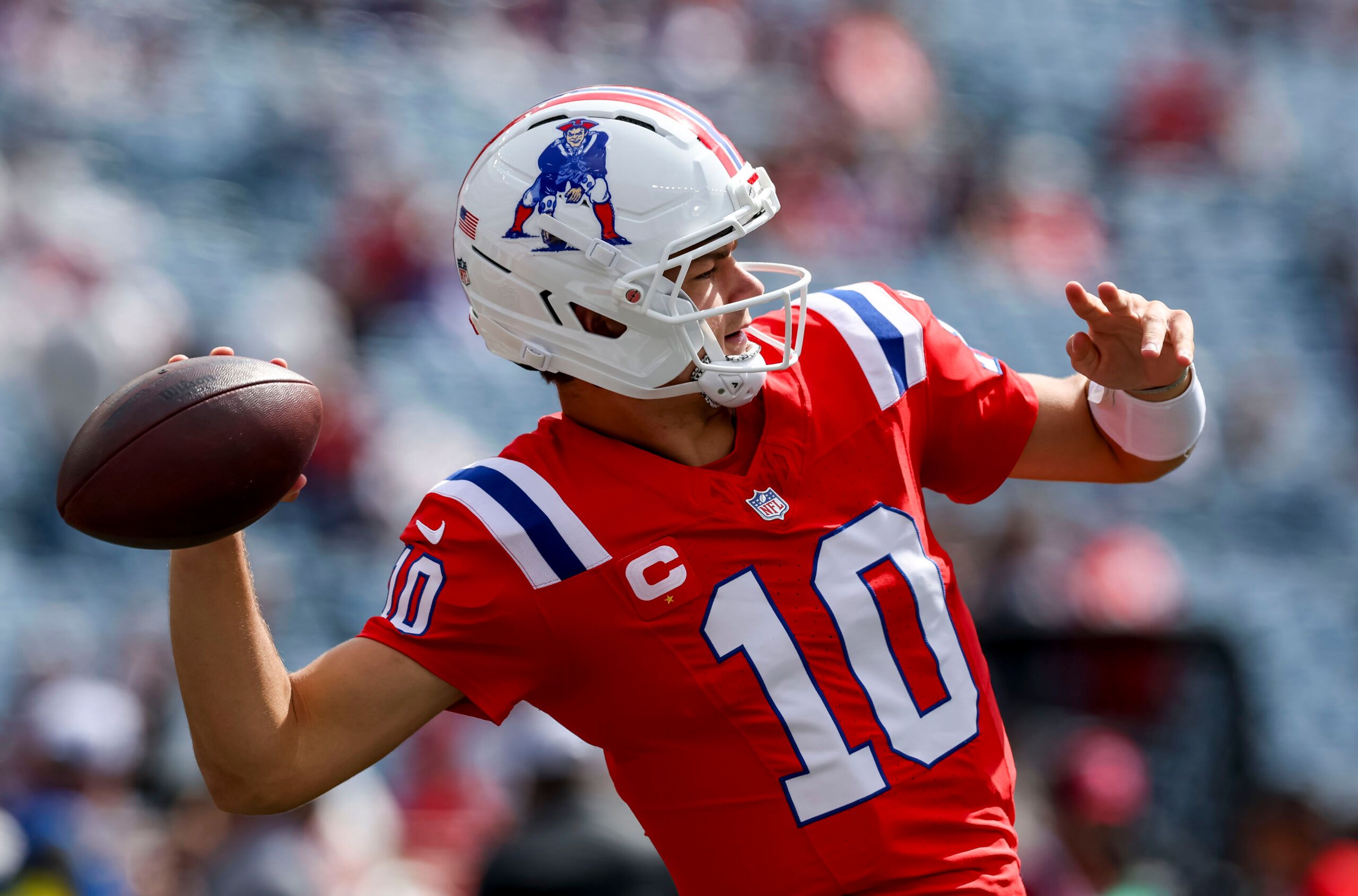 Drake Maye warms up before the Patriots-Steelers game at Gillette Stadium.