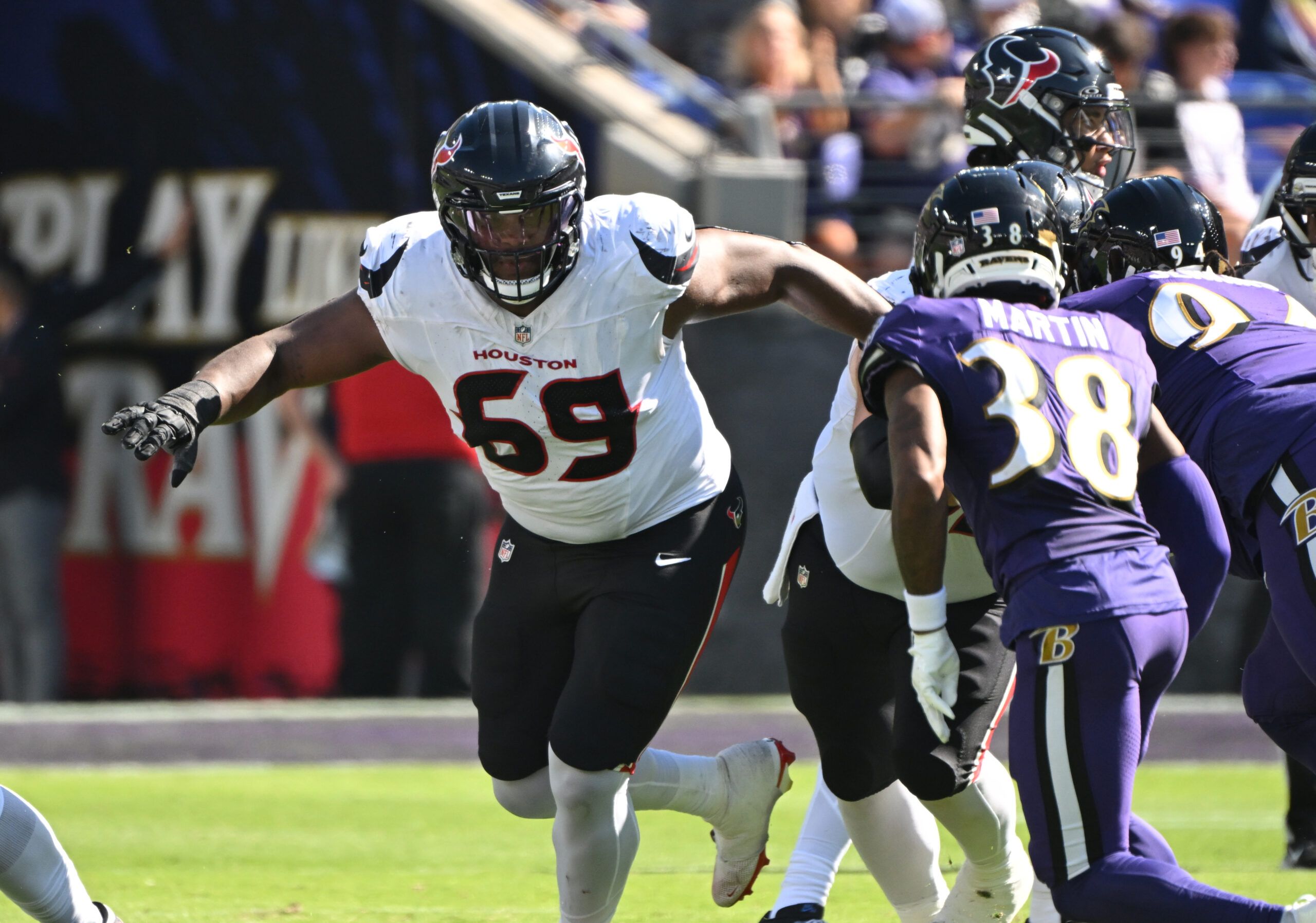 Ed Ingram blocks against Keyon Martin during Texans-Ravens at M&T Bank Stadium.