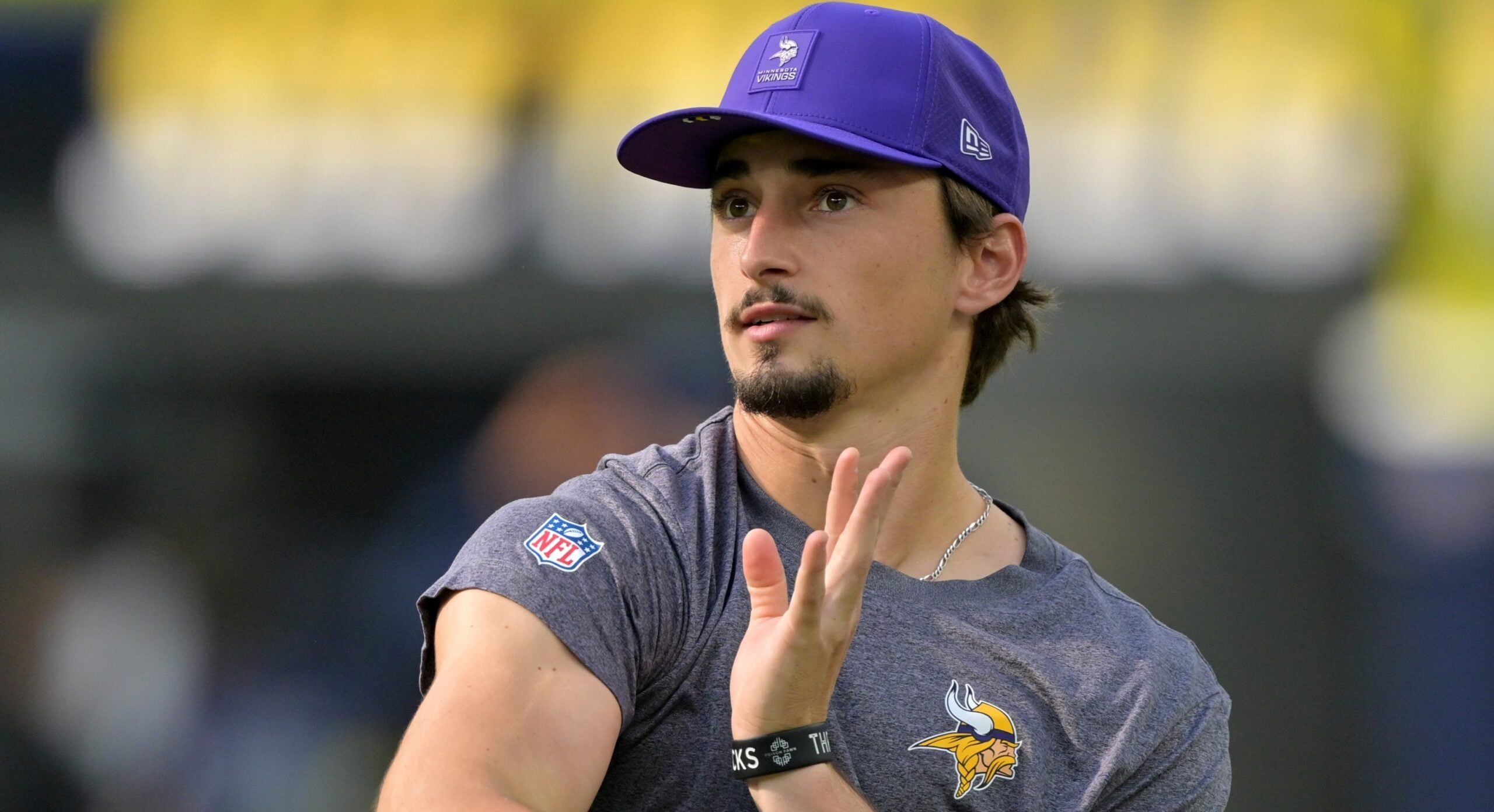Max Brosmer warms up before facing the Chargers at SoFi Stadium.
