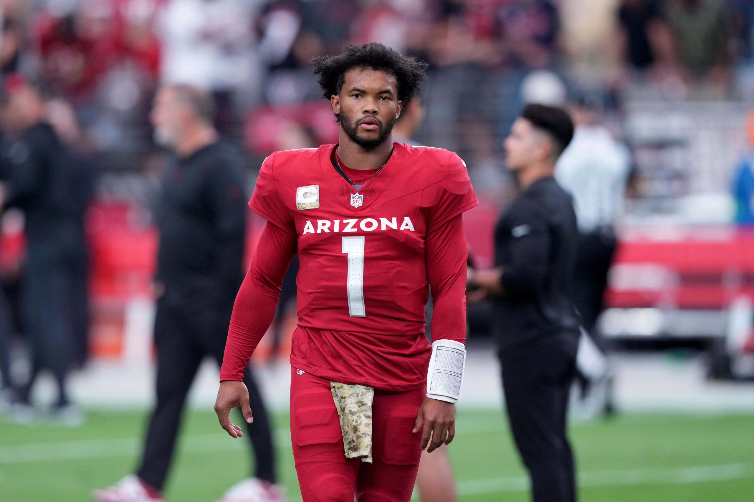 Kyler Murray warms up before a Cardinals game at State Farm Stadium.
