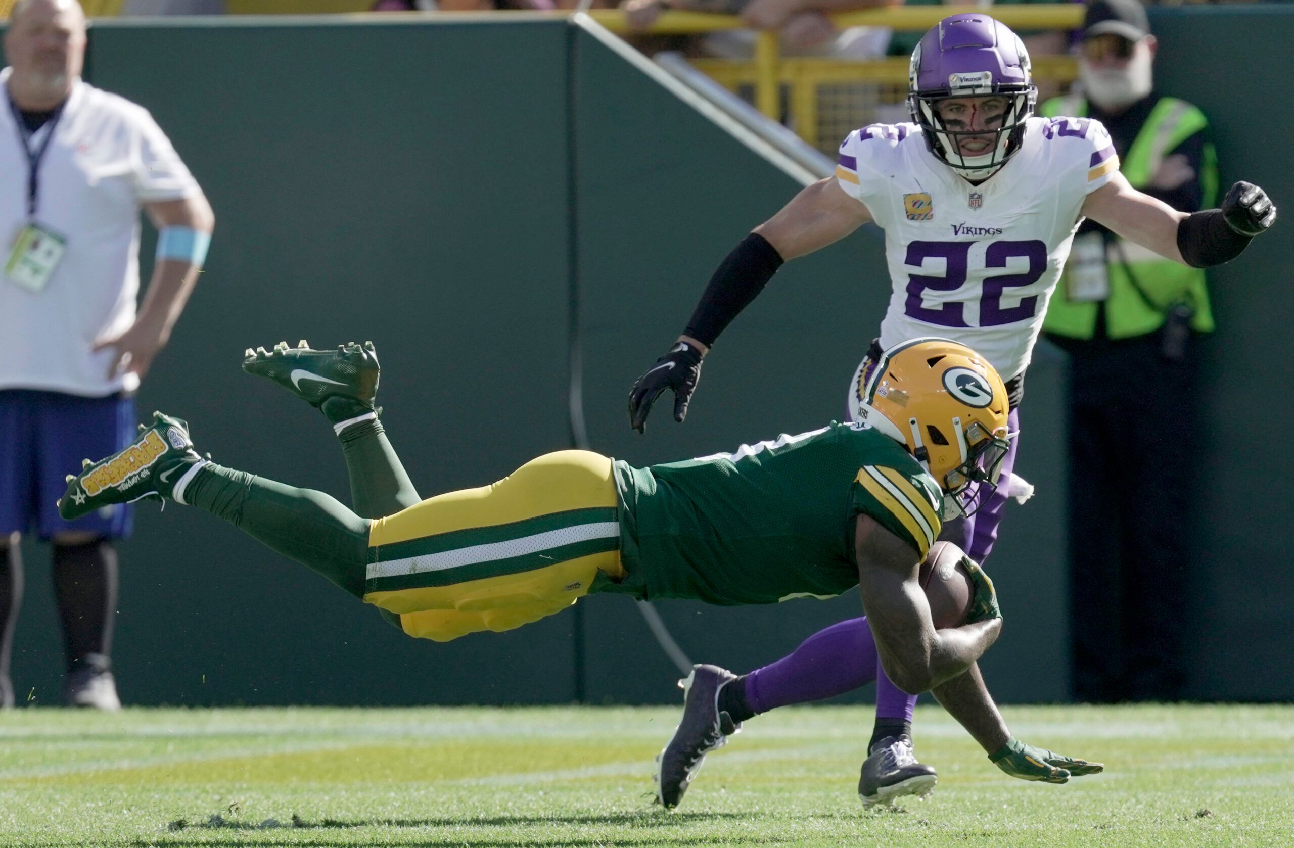 Packers RB Josh Jacobs in 2024 vs. Vikings safety Harrison Smith
