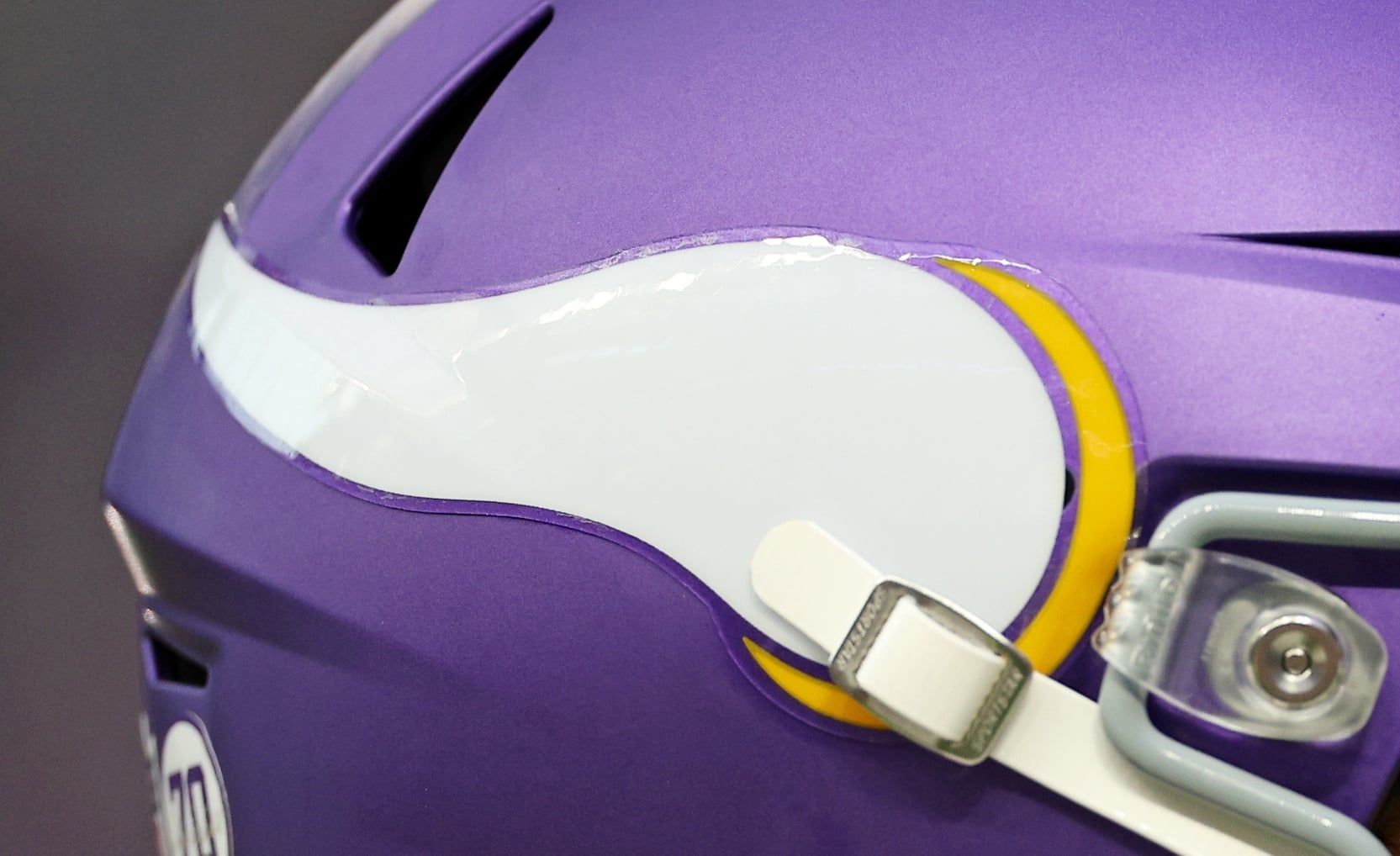 Vikings quarterback J.J. McCarthy (helmet) takes the field before a home game at U.S. Bank Stadium.