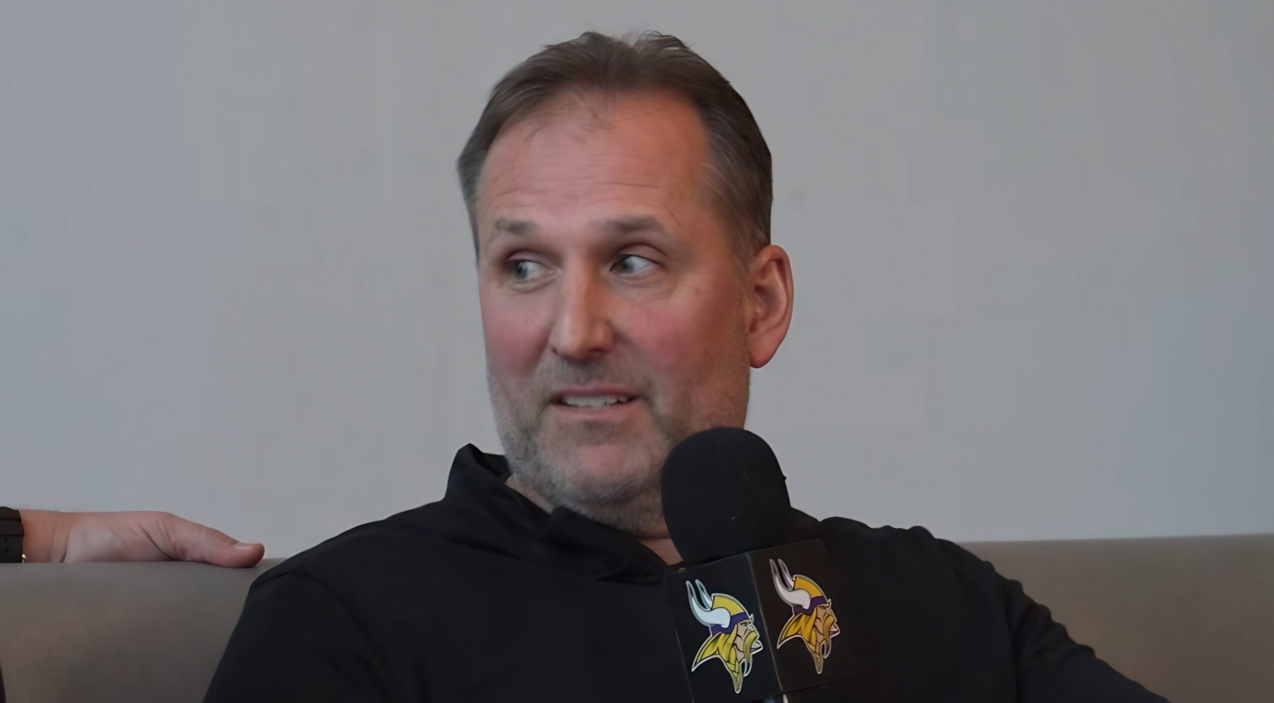 Rob Brzezinski speaks with Paul Allen and Pete Bercich at the NFL Scouting Combine