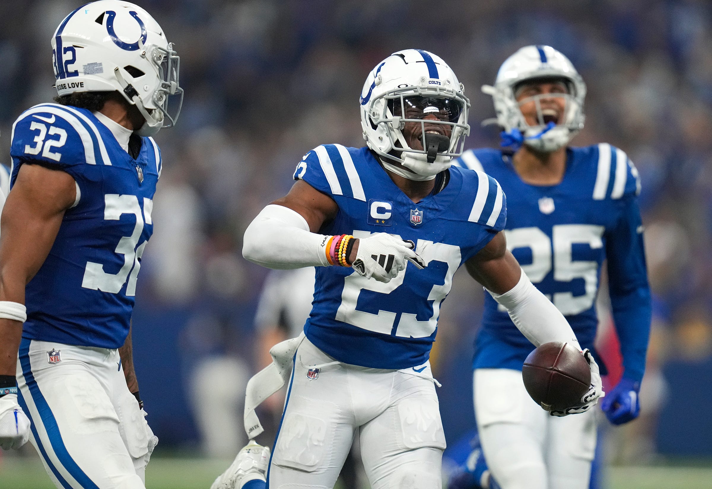 Kenny Moore II celebrates after an interception during a game against the Rams at Lucas Oil Stadium.