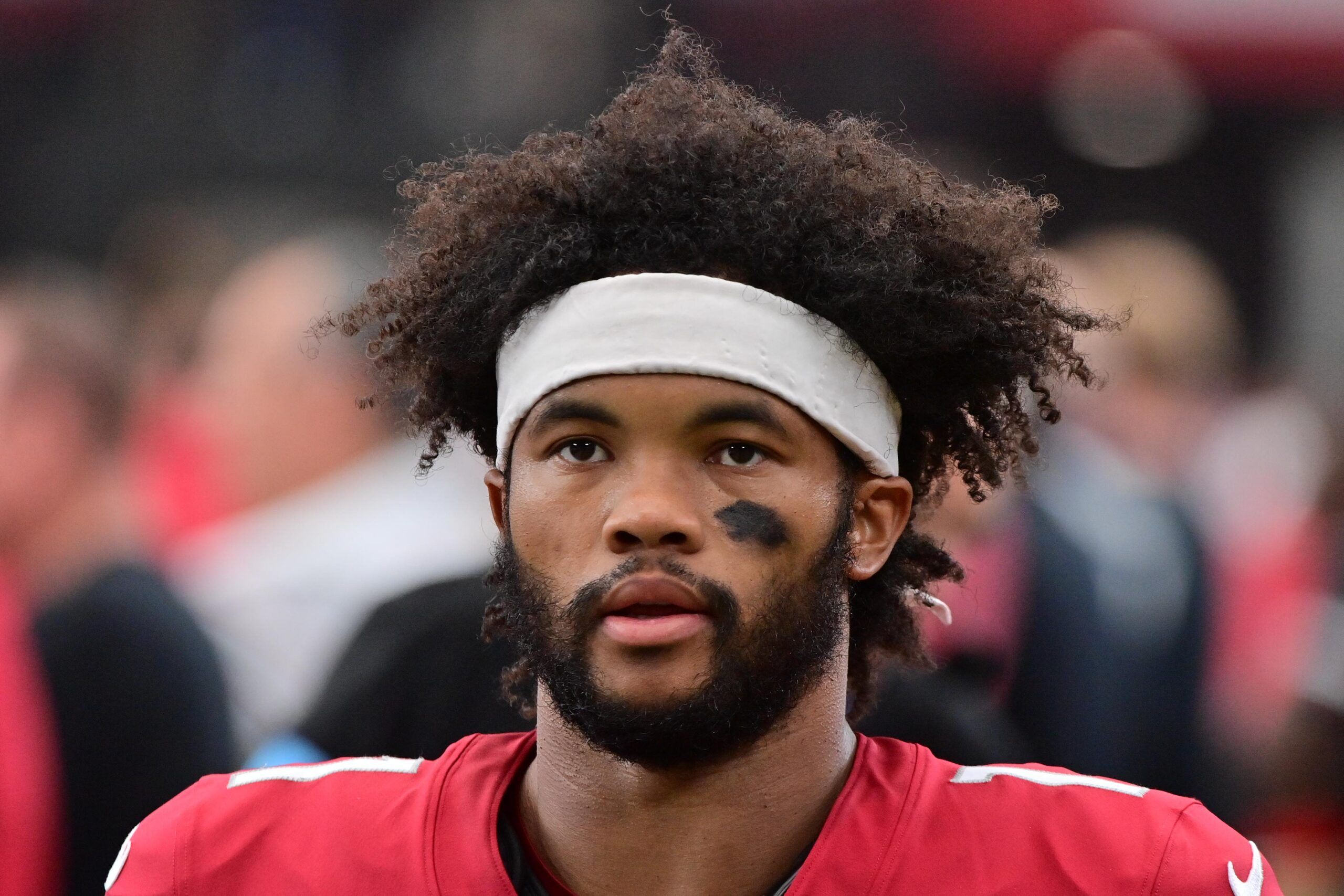 Kyler Murray looks on during pregame warmups before a game against the Rams at State Farm Stadium.