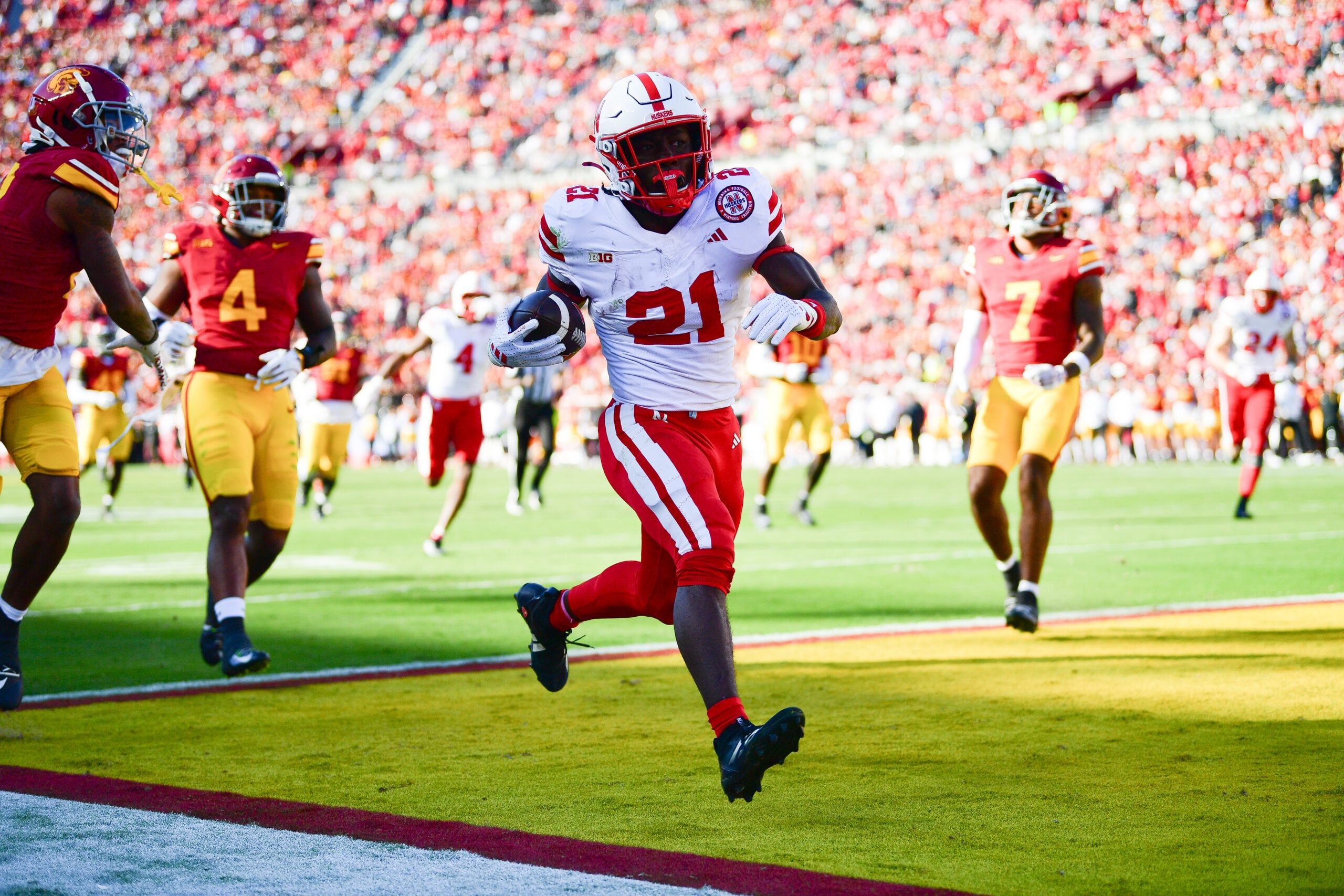 Emmett Johnson scores a touchdown during a game against USC at the Los Angeles Memorial Coliseum.