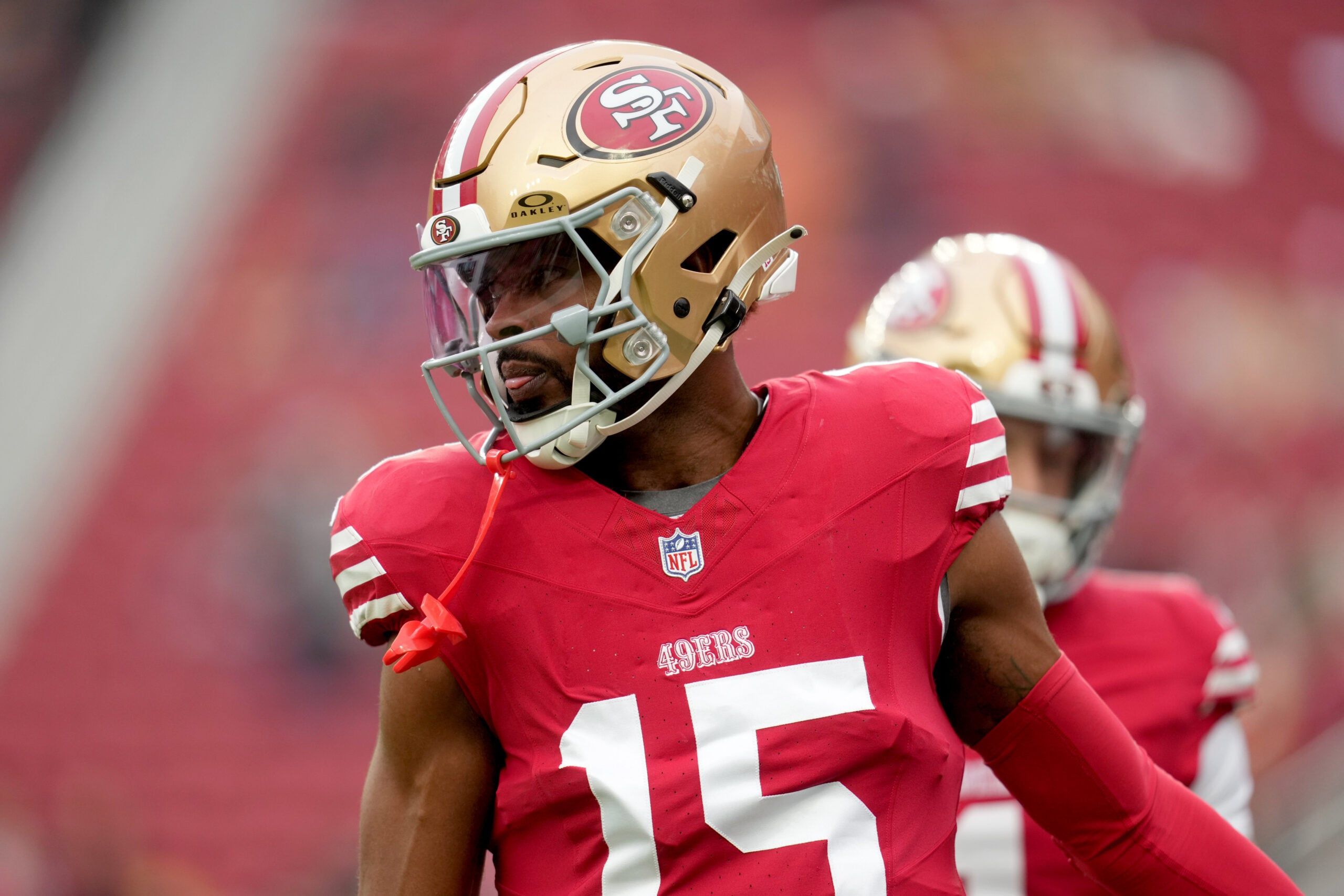 Jauan Jennings warms up on the field before a 49ers game at Levi’s Stadium.
