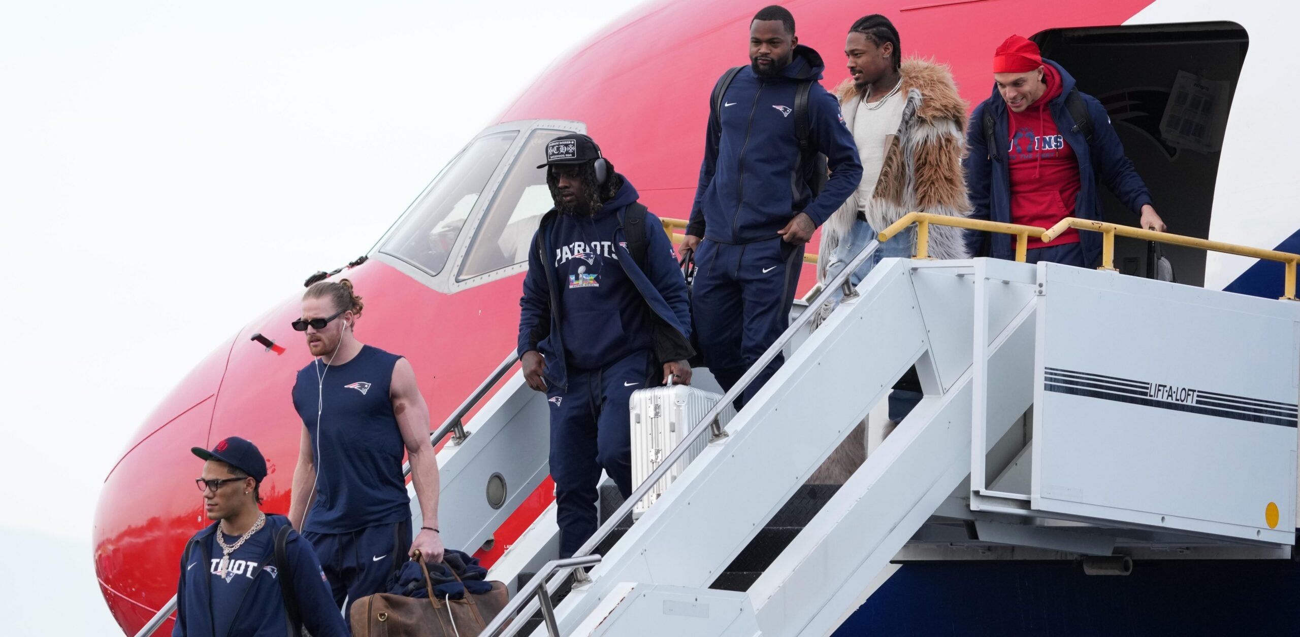 Stefon Diggs and other Patriots players arrive for the Super Bowl