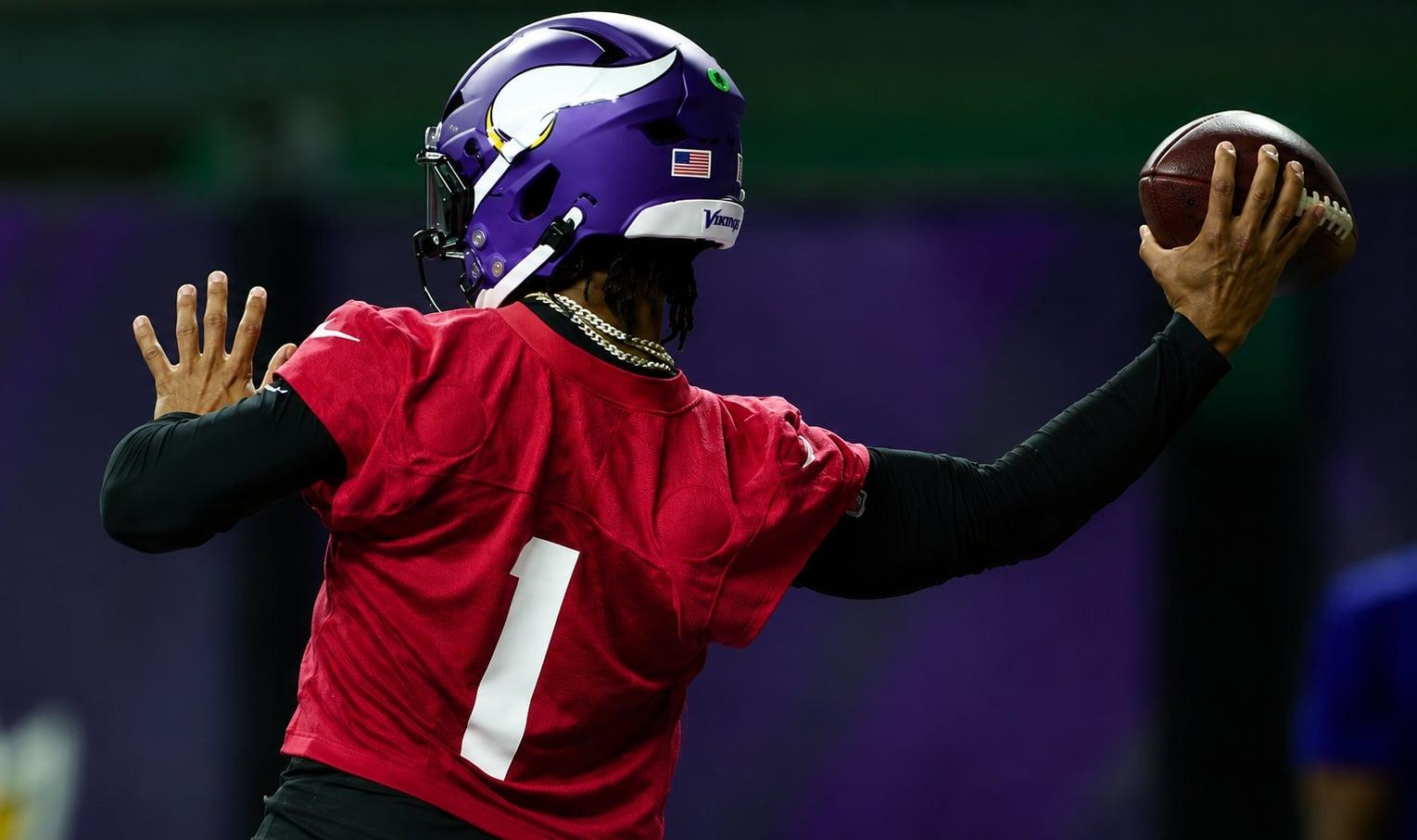 Minnesota Vikings quarterback Kyler Murray throws a pass during minicamp practice.