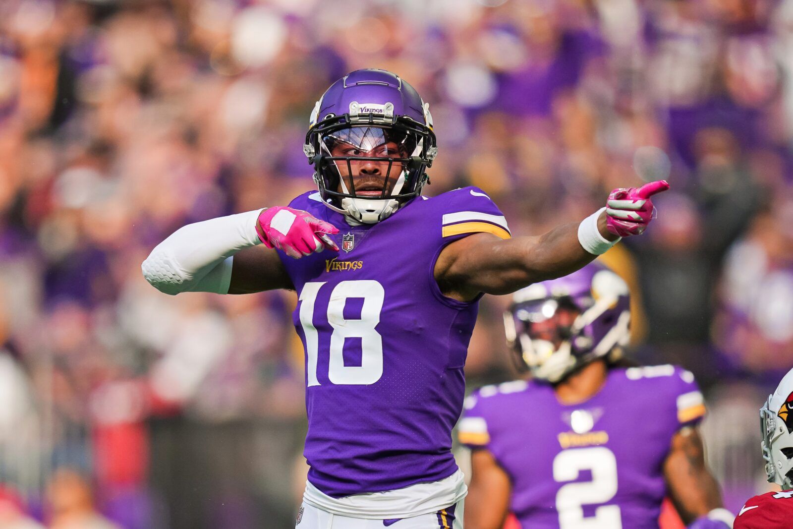 Justin Jefferson celebrates a first down for the Vikings against the Cardinals.