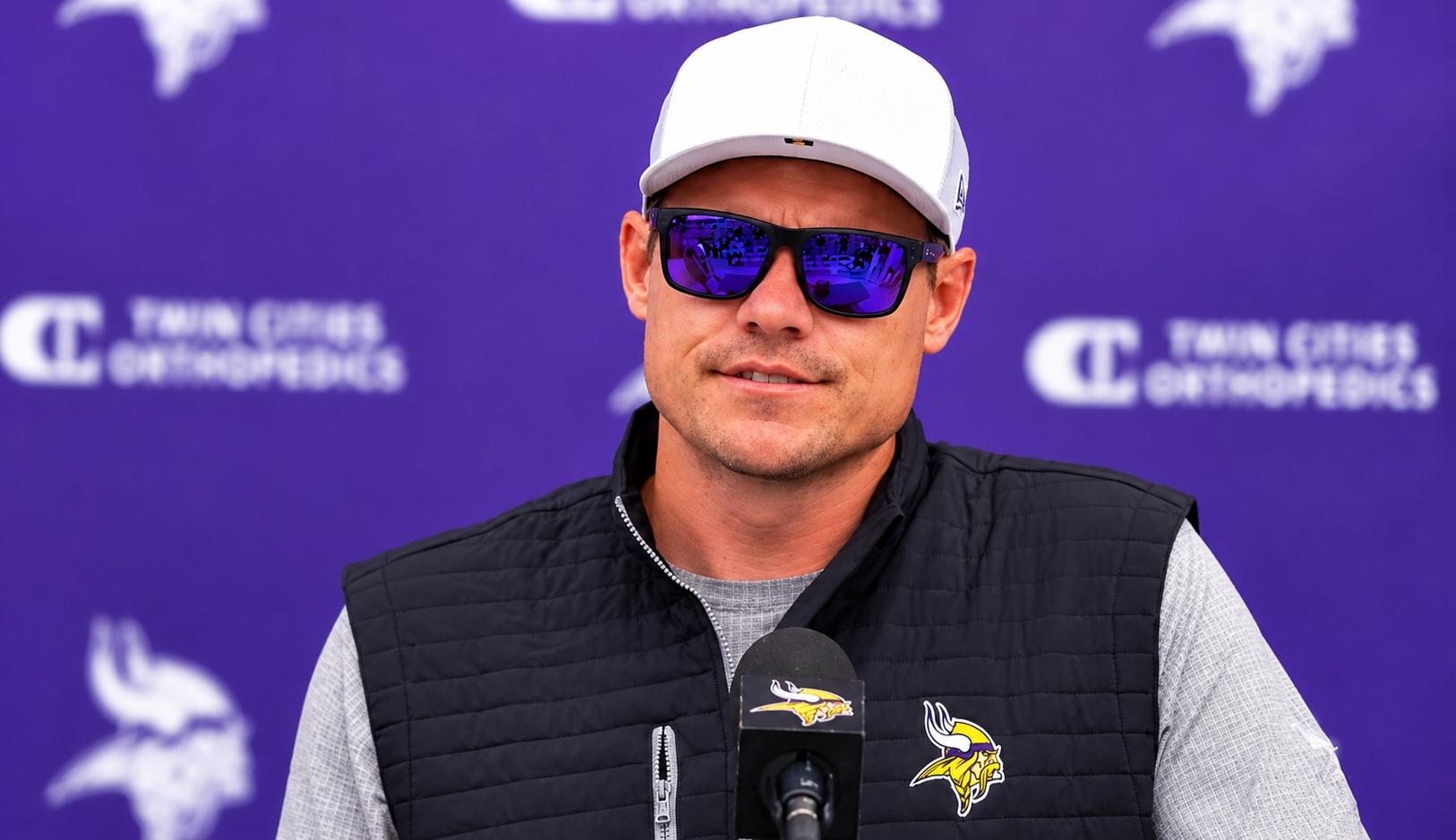 Minnesota Vikings head coach Kevin O’Connell speaks with reporters after an organized team activities session at team headquarters. Following OTA practice on June 4, 2026, at the TCO Performance Center in Eagan, Minnesota, O’Connell discussed roster developments, quarterback competition, and the club’s progress as preparations continued for the upcoming season. Mandatory Credit: YouTube.