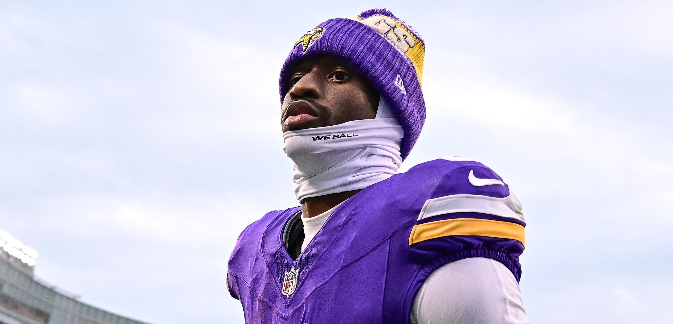 Jordan Addison walks toward the sideline after the Vikings defeated the Bears.