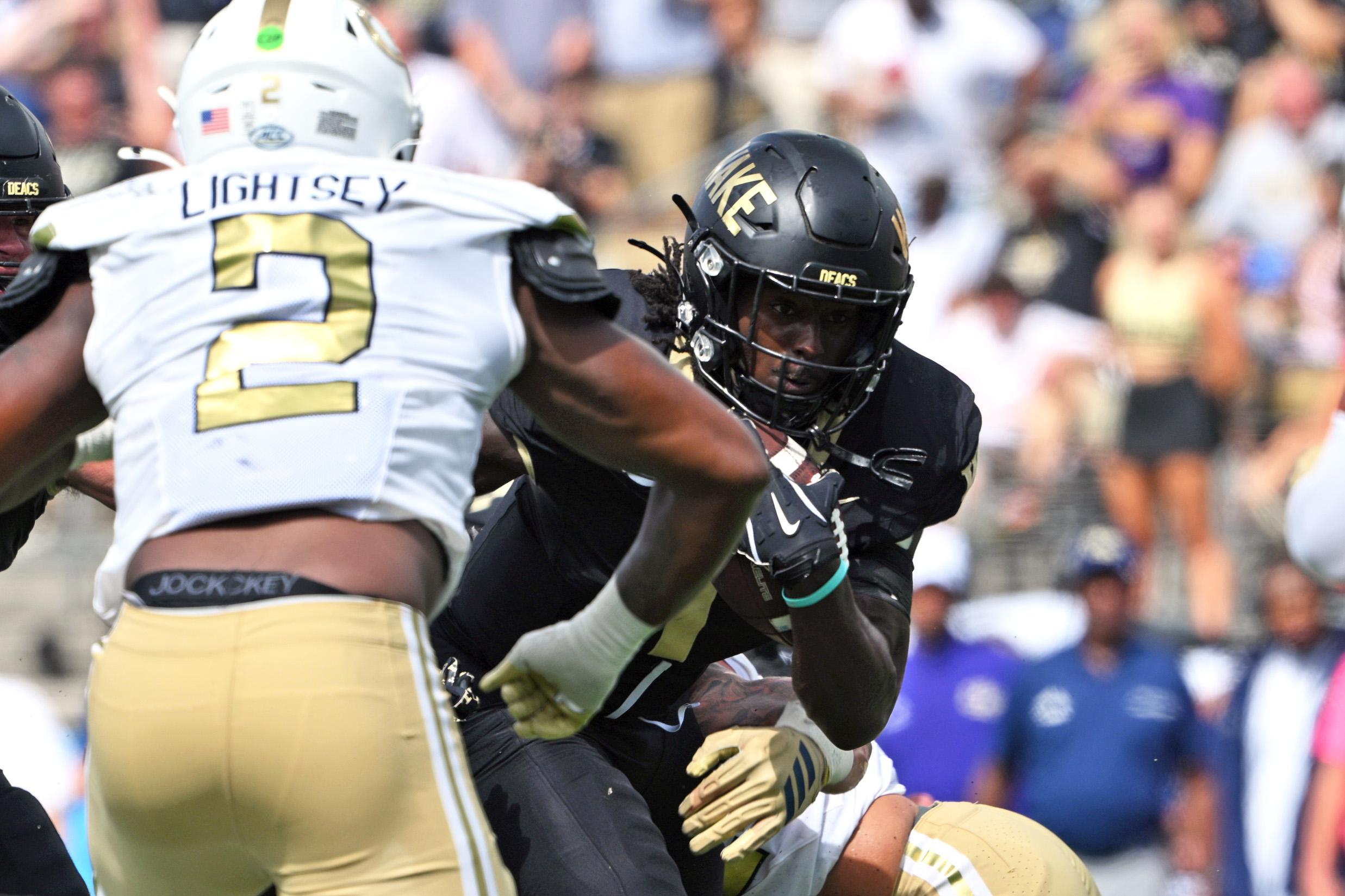 Demond Claiborne runs with the ball during Wake Forest's game against Georgia Tech.