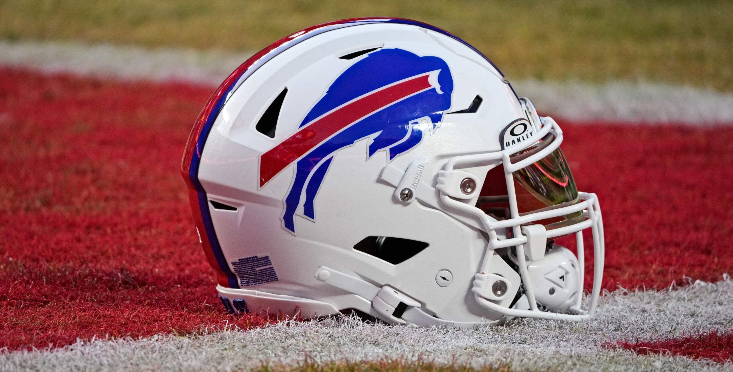 a Buffalo Bills helmet displayed on the field during the 2024 season.