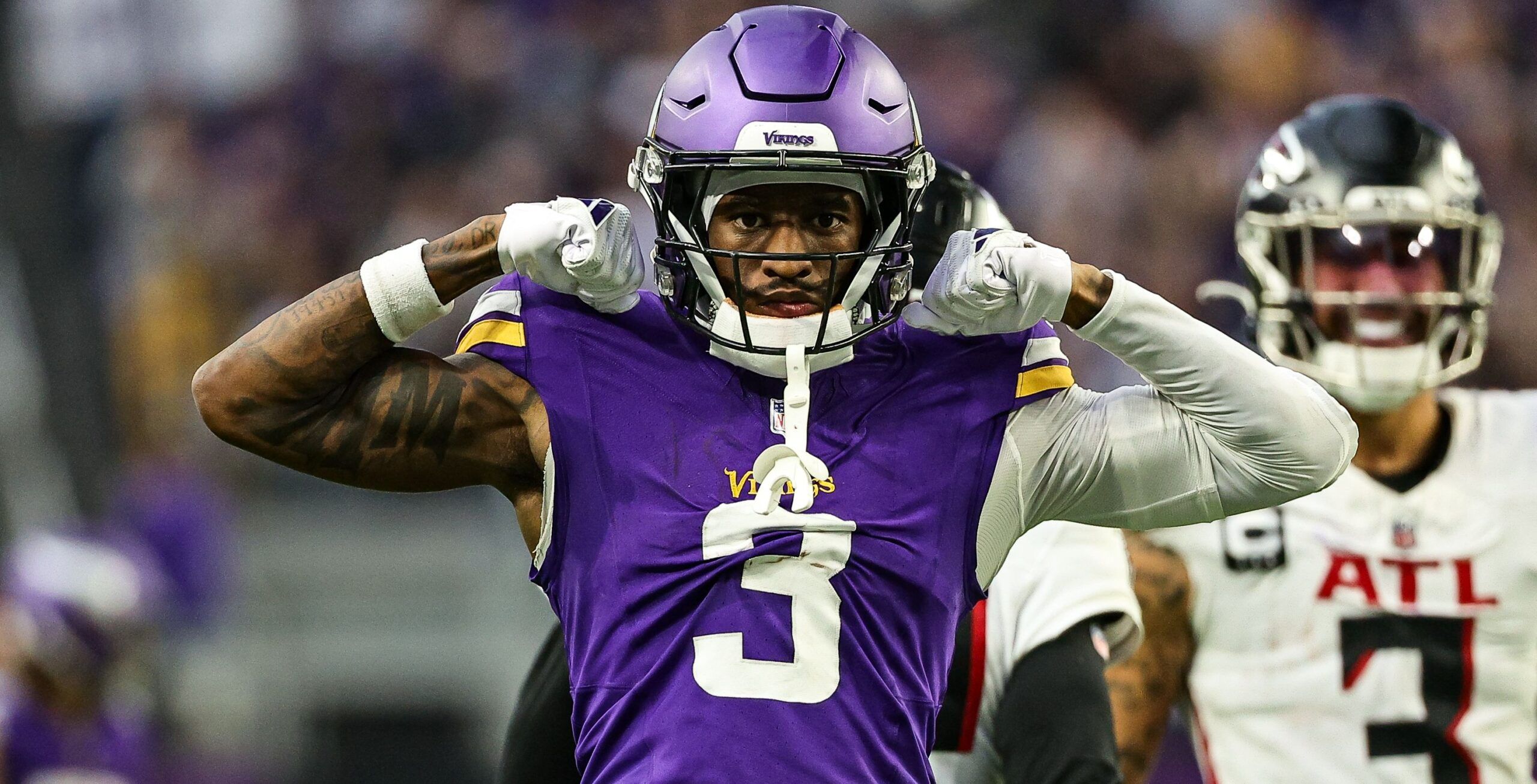 Jordan Addison celebrates a catch against the Falcons at U.S. Bank Stadium.