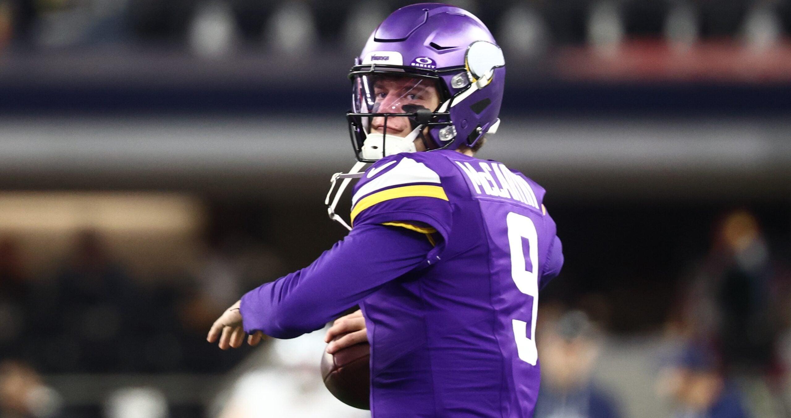 J.J. McCarthy warms up on the field before a Vikings road game against the Dallas Cowboys at AT&T Stadium.