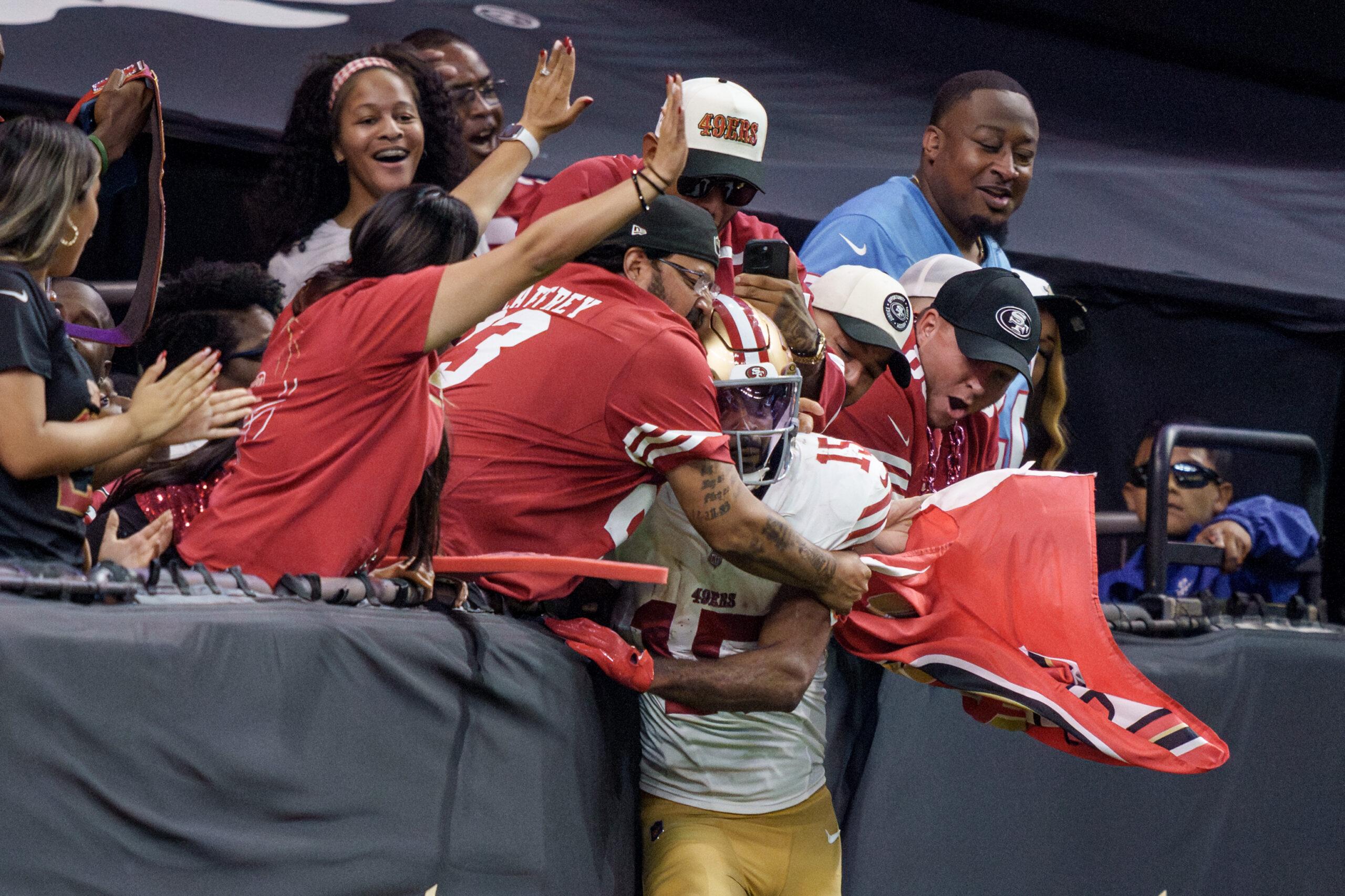 49ers wide receiver Jauan Jennings celebrates a touchdown with fans at Caesars Superdome in New Orleans.