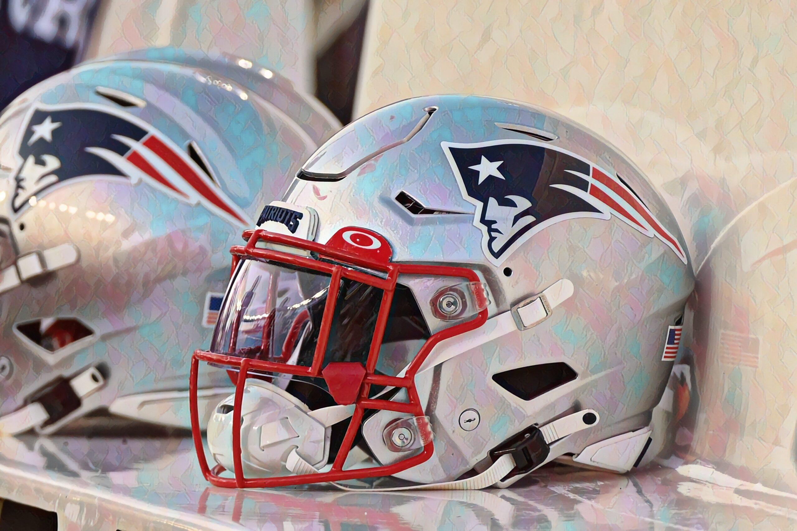 A New England Patriots helmet sits on the bench before a preseason game against the Carolina Panthers at Gillette Stadium.