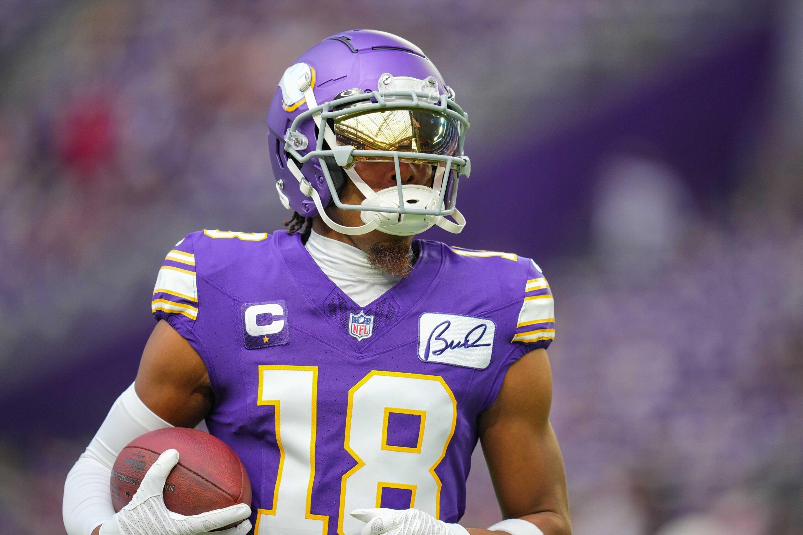 Minnesota Vikings wide receiver Justin Jefferson warms up before a game against the Tampa Bay Buccaneers.