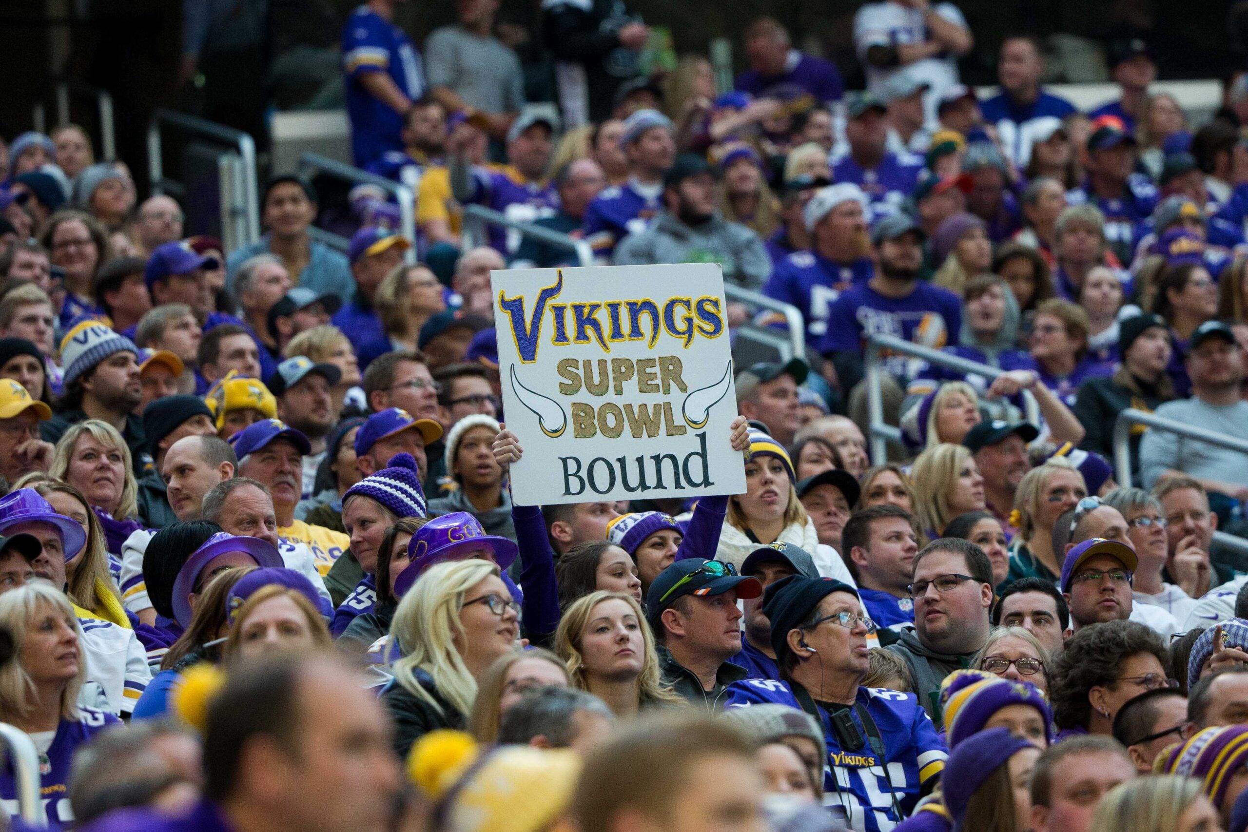Minnesota Vikings fan holds up a sign during a home game against the Chicago Bears.